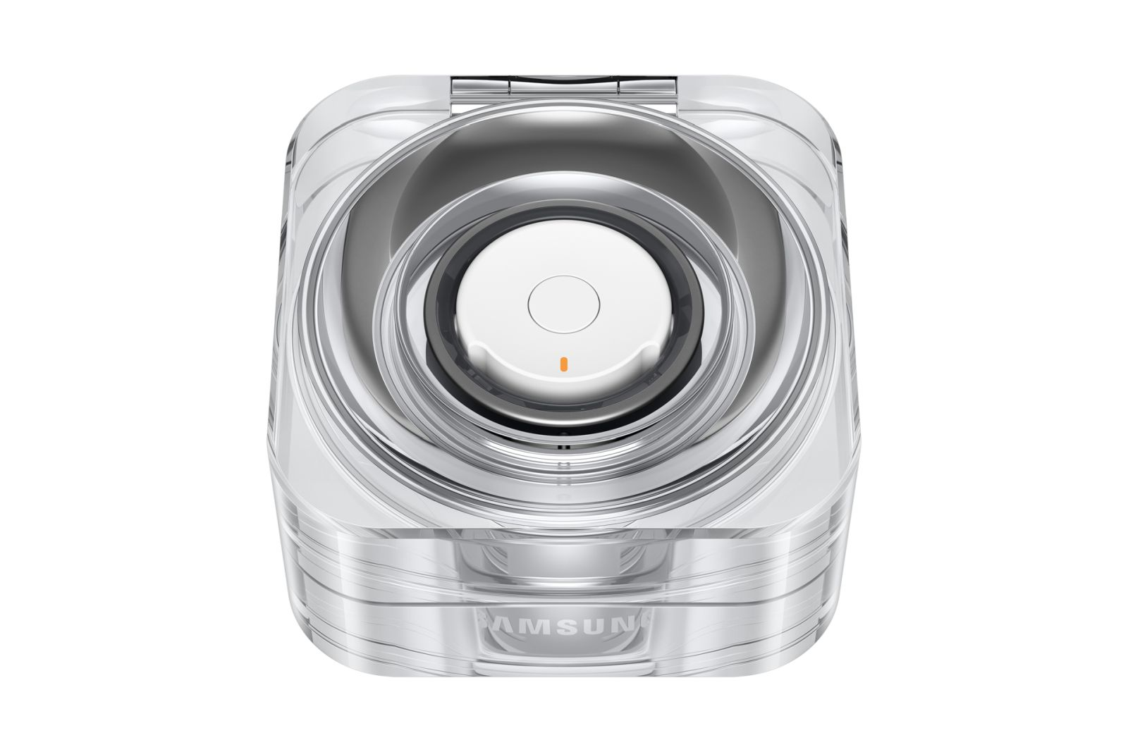 Ein transparentes, klares Gehäuse. Im Inneren ist ein weißes, kreisförmiges Objekt mit einer orangefarbenen Anzeige zu sehen. Das Wort SAMSUNG steht unten.