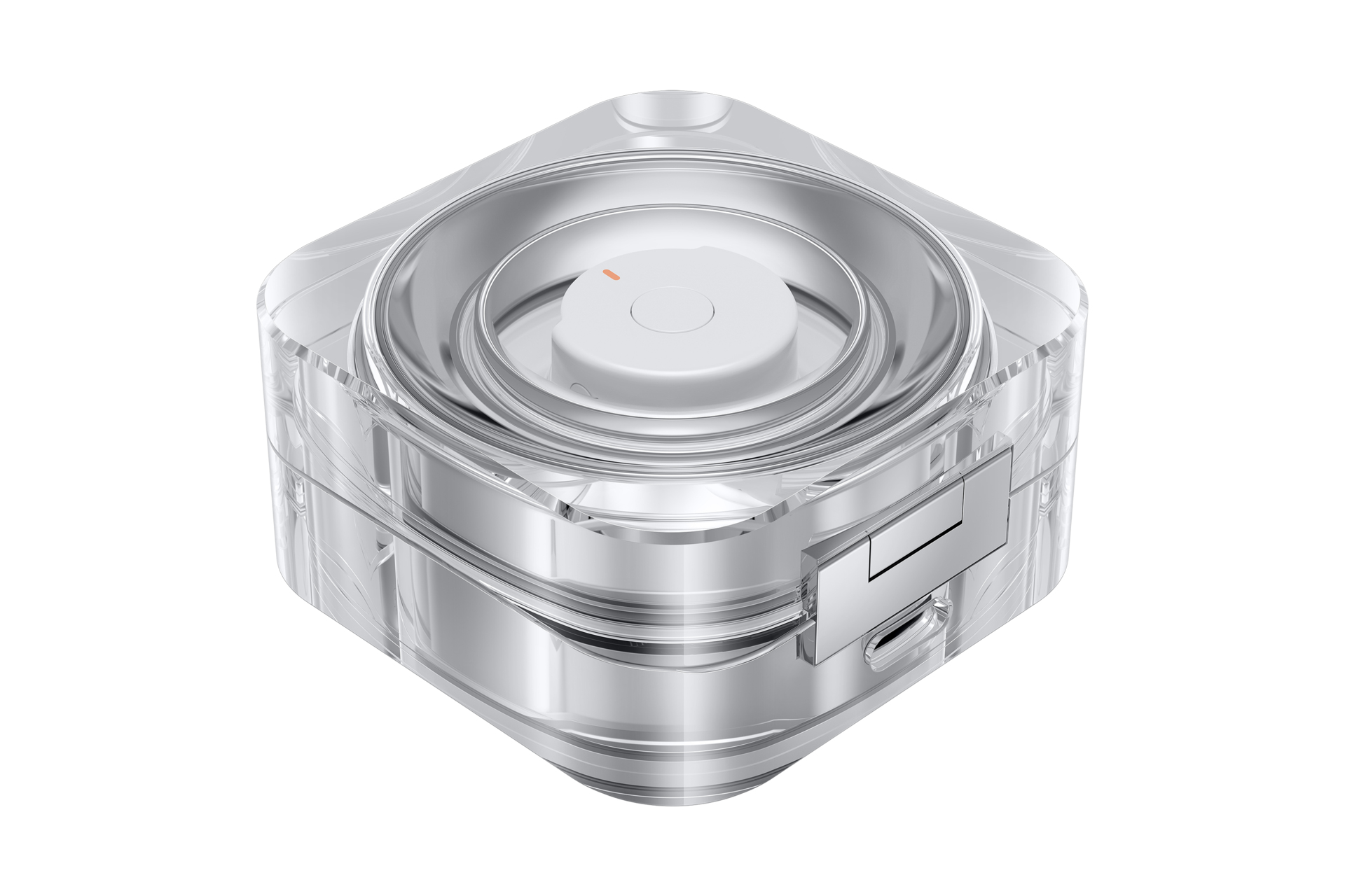 Un dispositivo transparente en forma de cubo. Tiene una parte superior circular blanca con un punto naranja y un borde plateado. La base también es plateada.