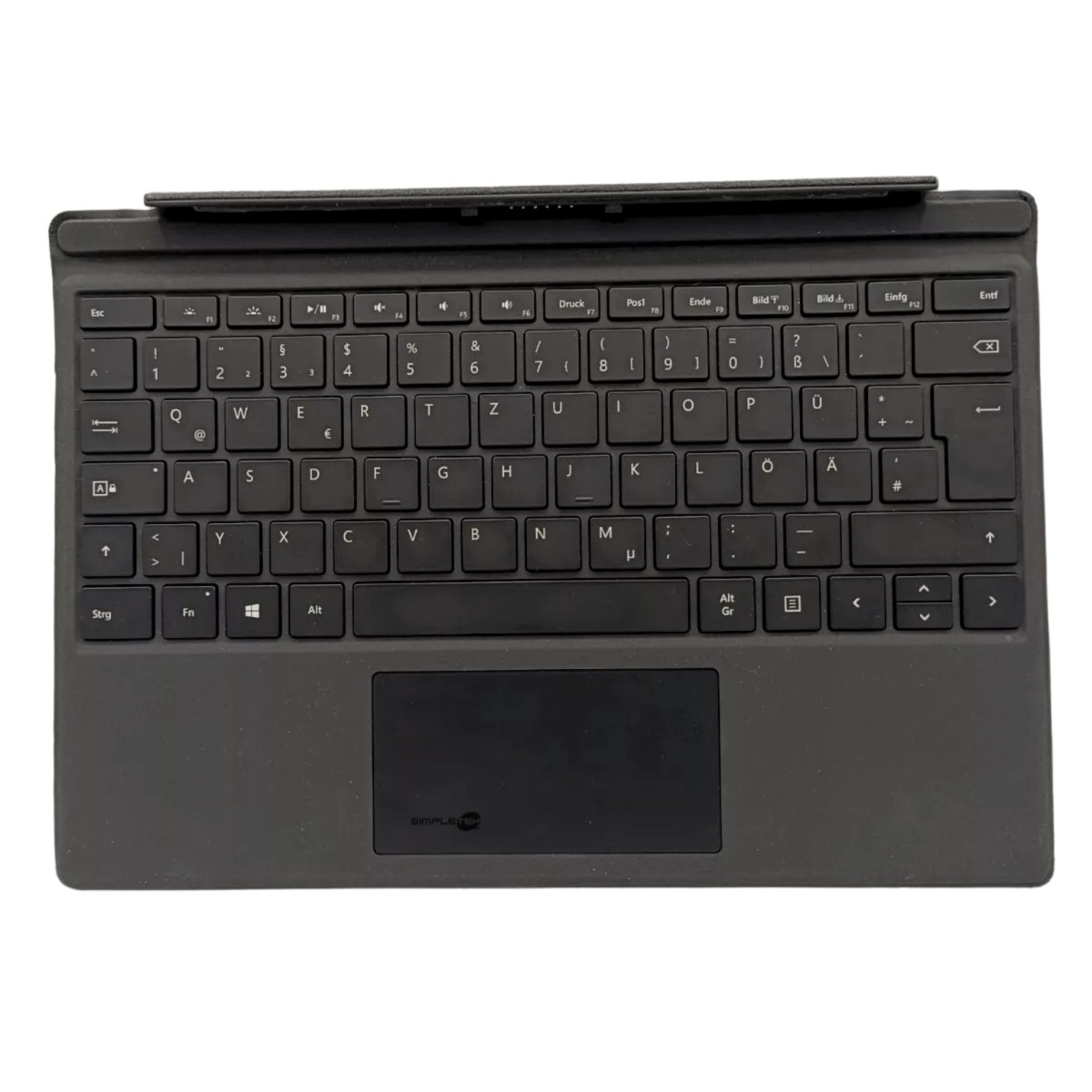Eine schwarze Tastatur mit weißen Buchstaben und Symbolen. Unten befindet sich ein Touchpad. Die Tastatur liegt auf einer dunklen Oberfläche.