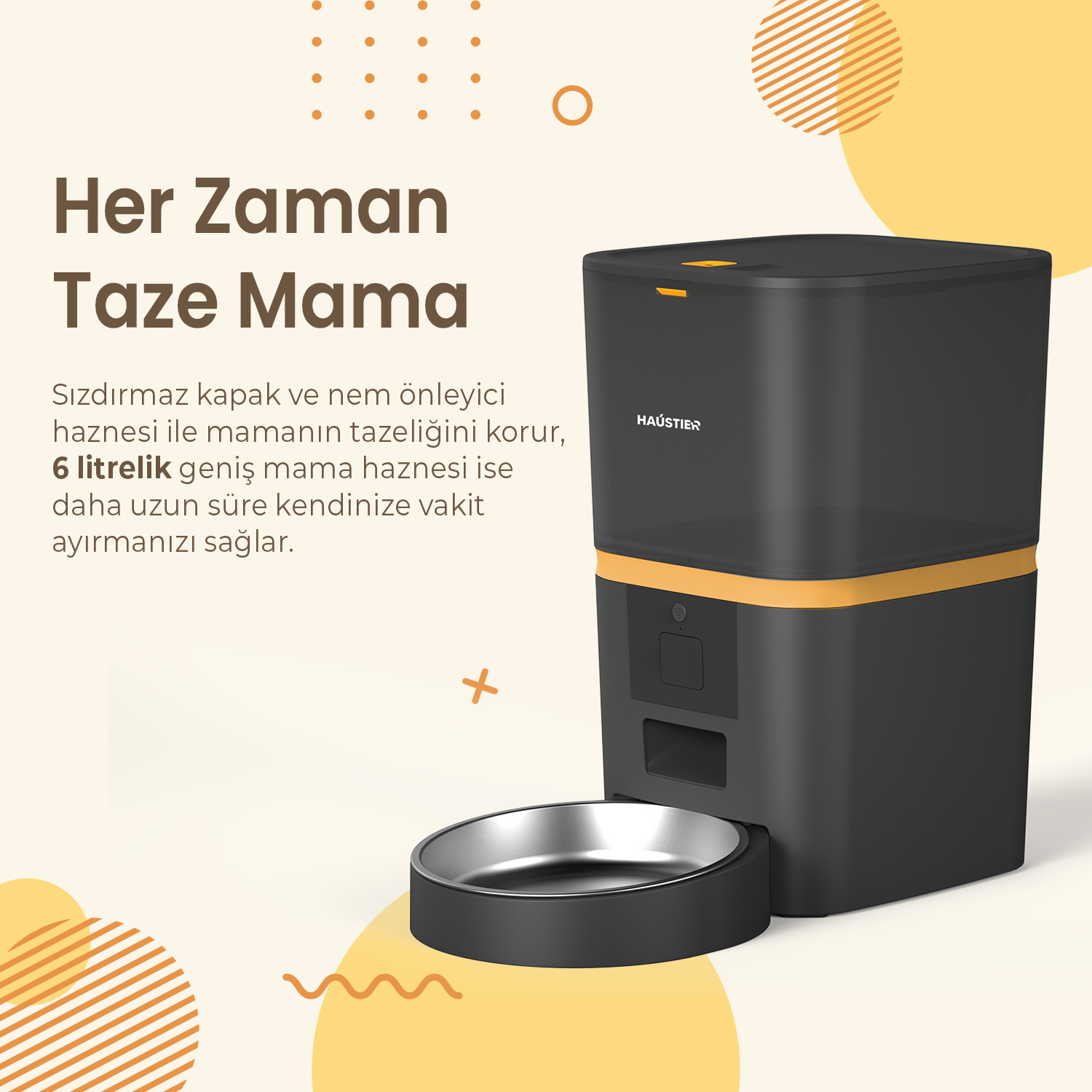 Siyah ve turuncu tasarımlı otomatik bir evcil hayvan besleyici. Metin 'Her Zaman Taze Mama' içerir. Önde bir kap var.