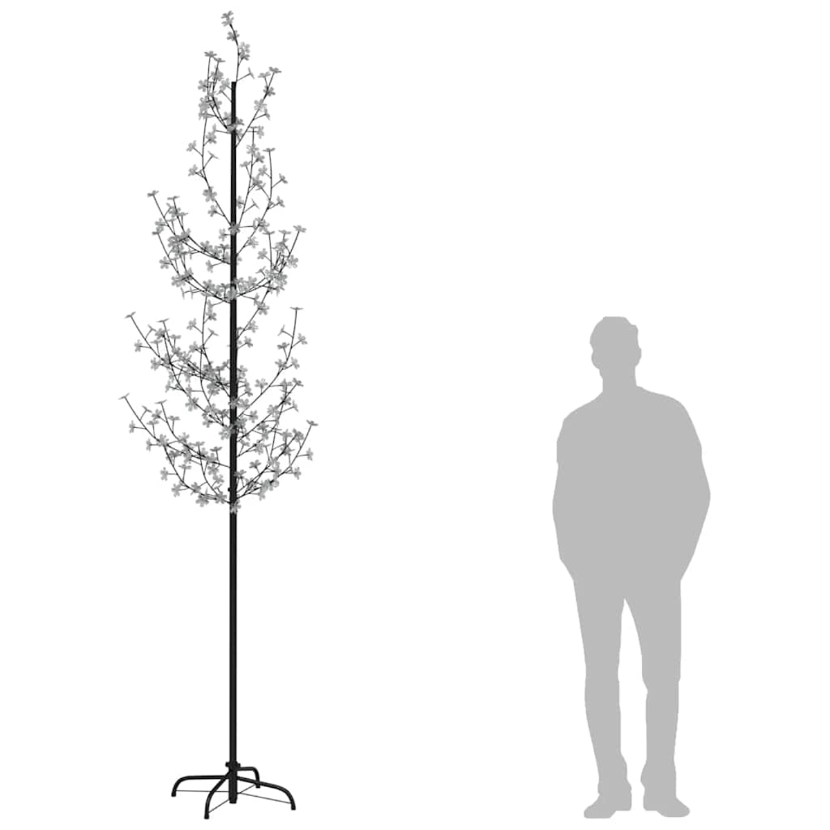 Ein beleuchteter Baum mit weißen Blüten und einem schwarzen Stiel steht neben einer Silhouette einer Person vor weißem Hintergrund.