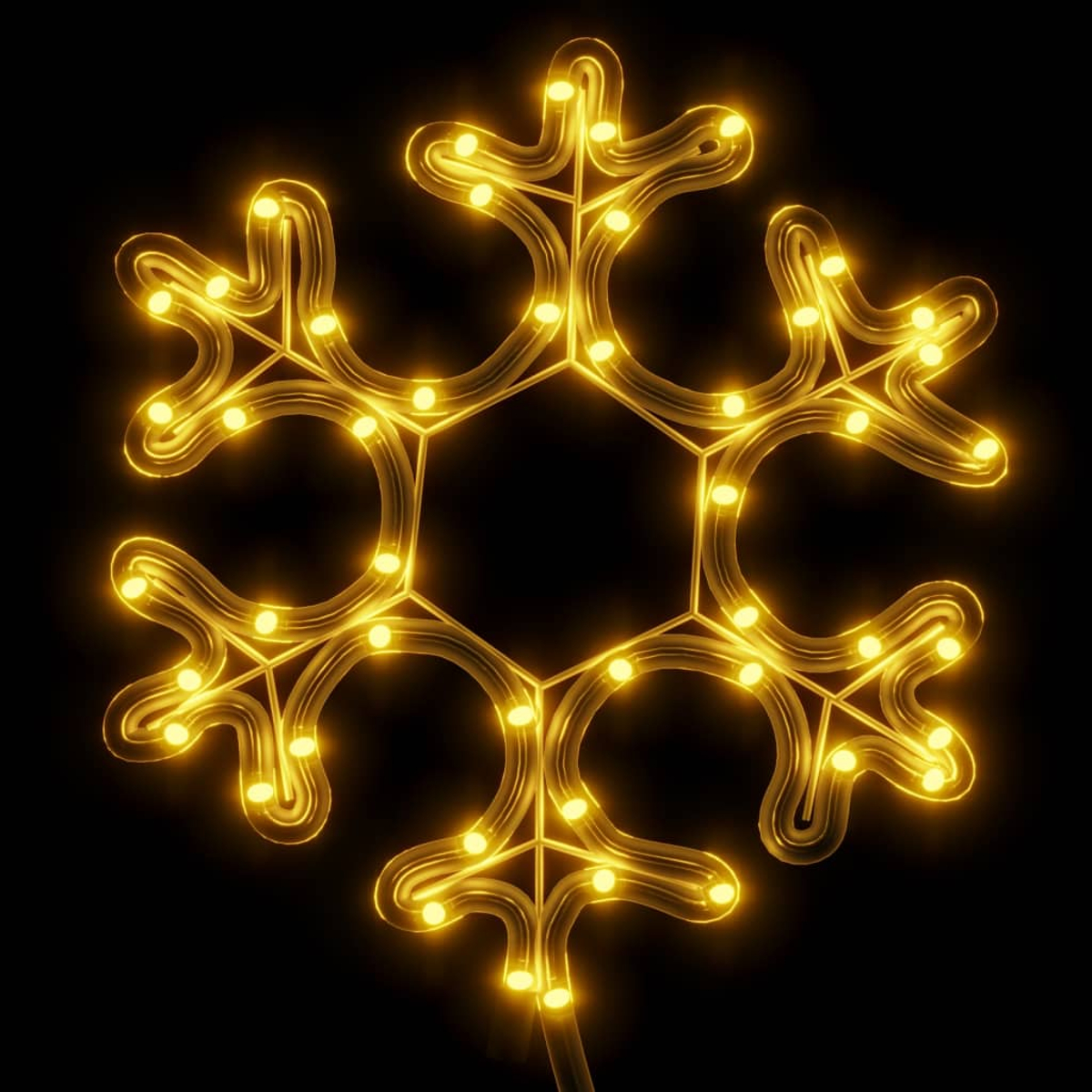 Eine leuchtende Schneeflocke Weihnachtsdekoration mit warmgelben Lichtern vor schwarzem Hintergrund. Die Schneeflocke hat sechs Spitzen.