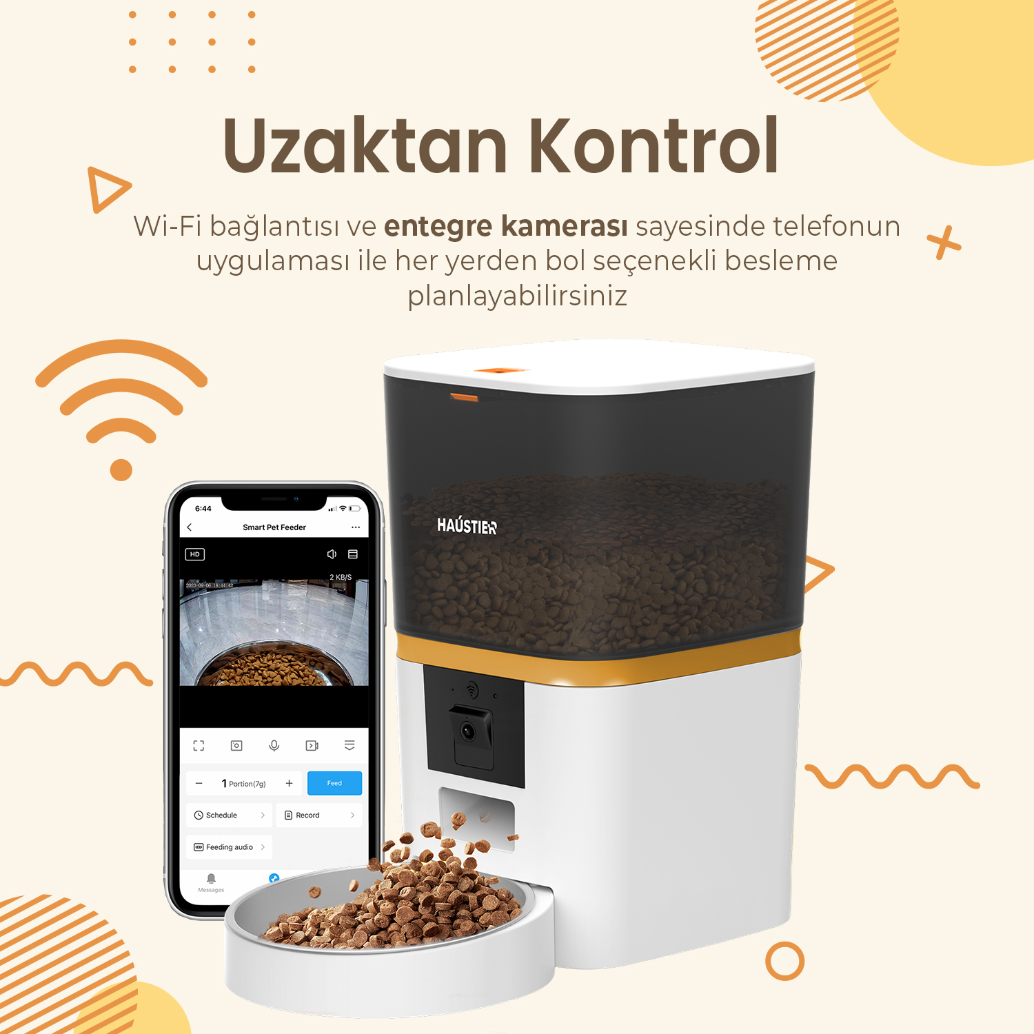 Canlı yayın gösteren bir telefonla birlikte akıllı bir evcil hayvan besleyici. Mama bir kaseye dağıtılıyor. Besleyici, altın rengi bir vurguya sahip beyazdır.