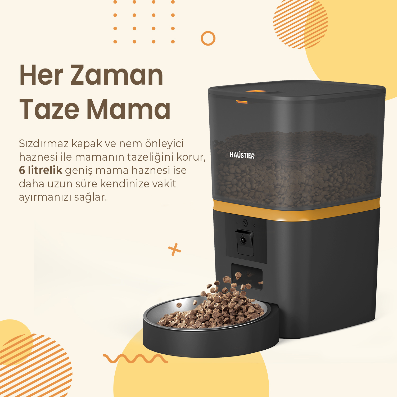 Otomatik bir evcil hayvan besleyici, yiyecekleri bir kaseye dağıtır. Besleyici, üzerinde 'HAUSTIER' markası bulunan siyah ve sarıdır.