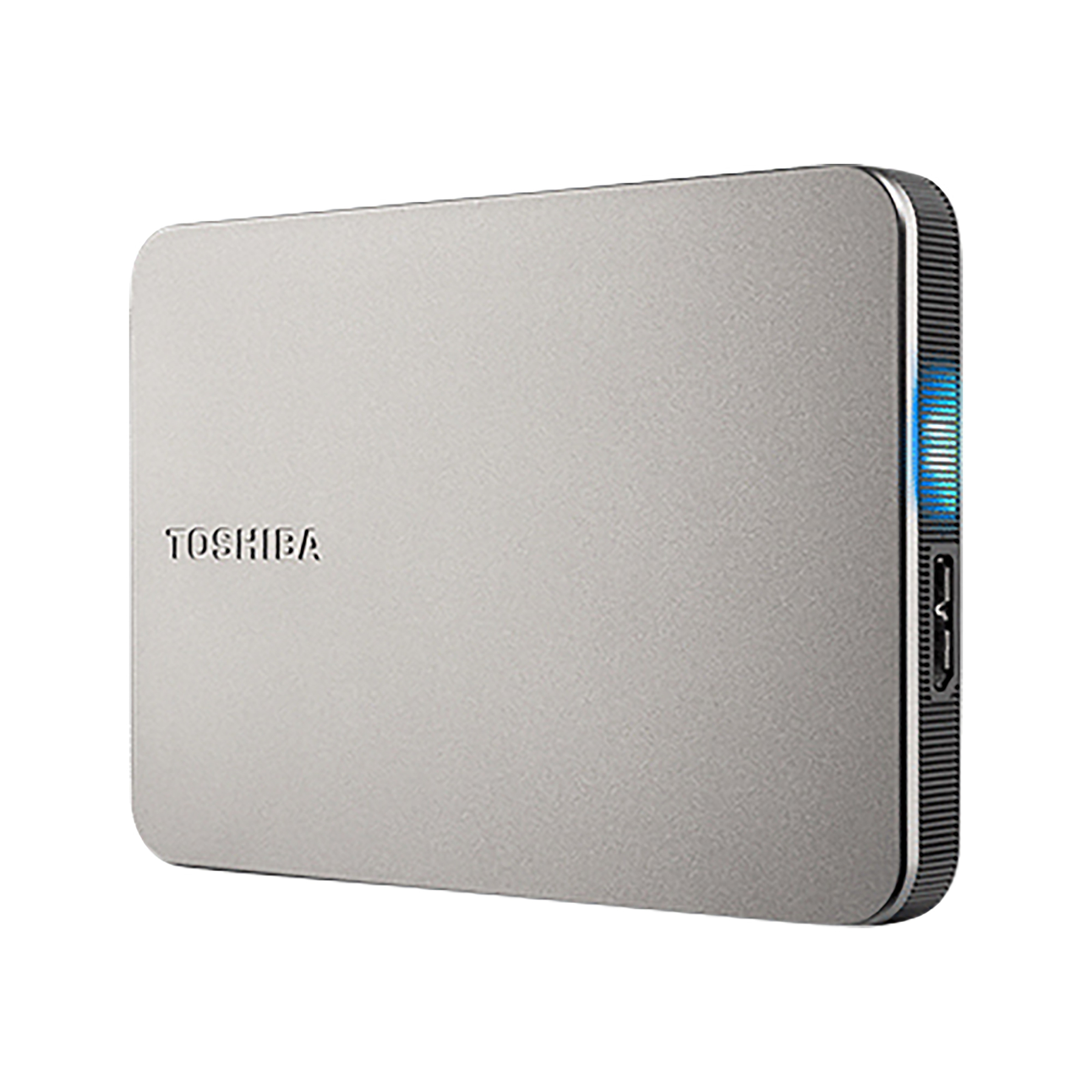 A silver Toshiba external hard drive. The drive is rectangular with rounded edges and a dark border on one side.