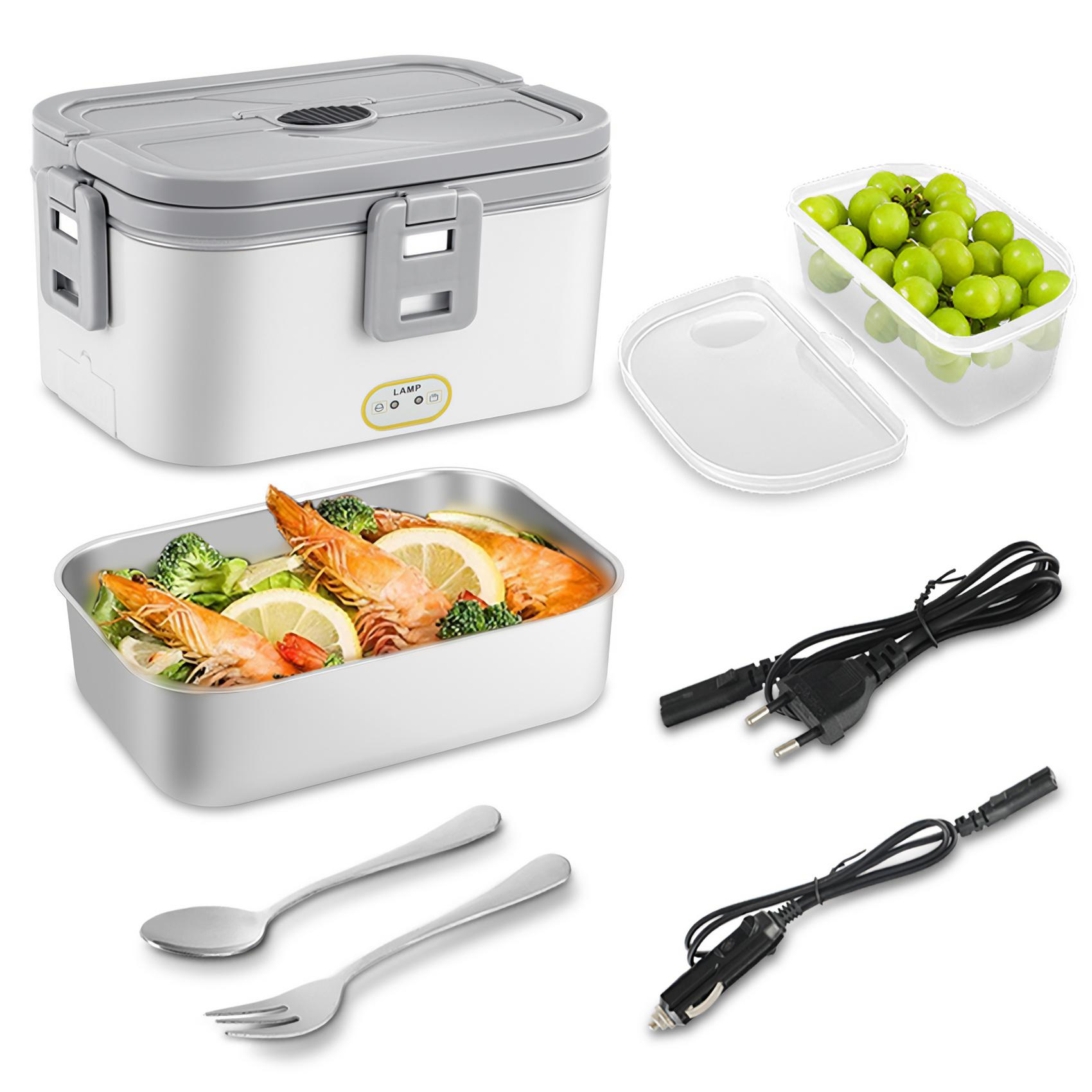 Eine weiß-graue Lunchbox, ein Behälter mit Trauben, Essen in einer Metallschale, Kabel und Besteck.