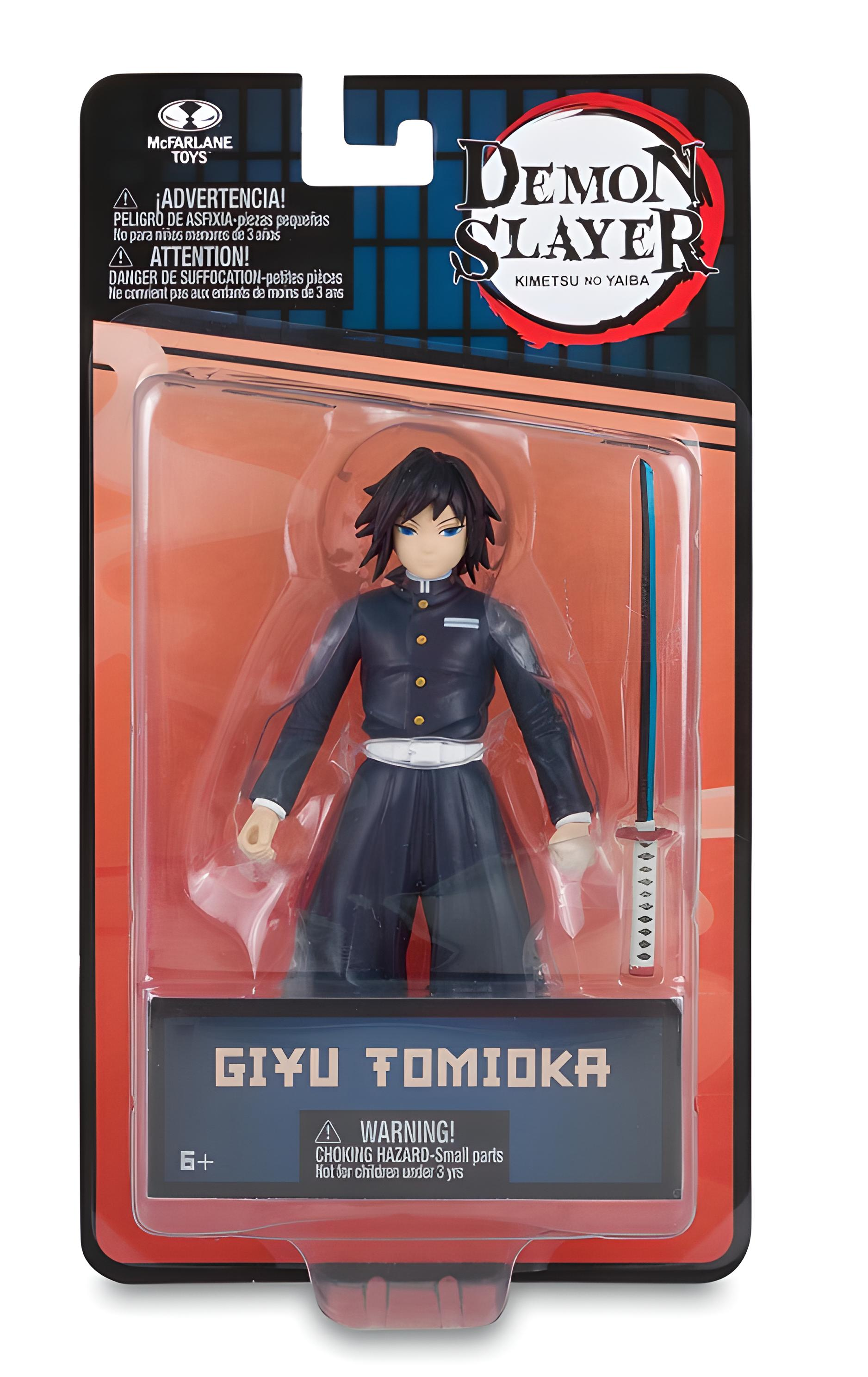 Actionfigur von Giyu Tomioka aus Demon Slayer. Er ist in einer Verpackung. Schwarze Haare, blaue Augen und Schwert.
