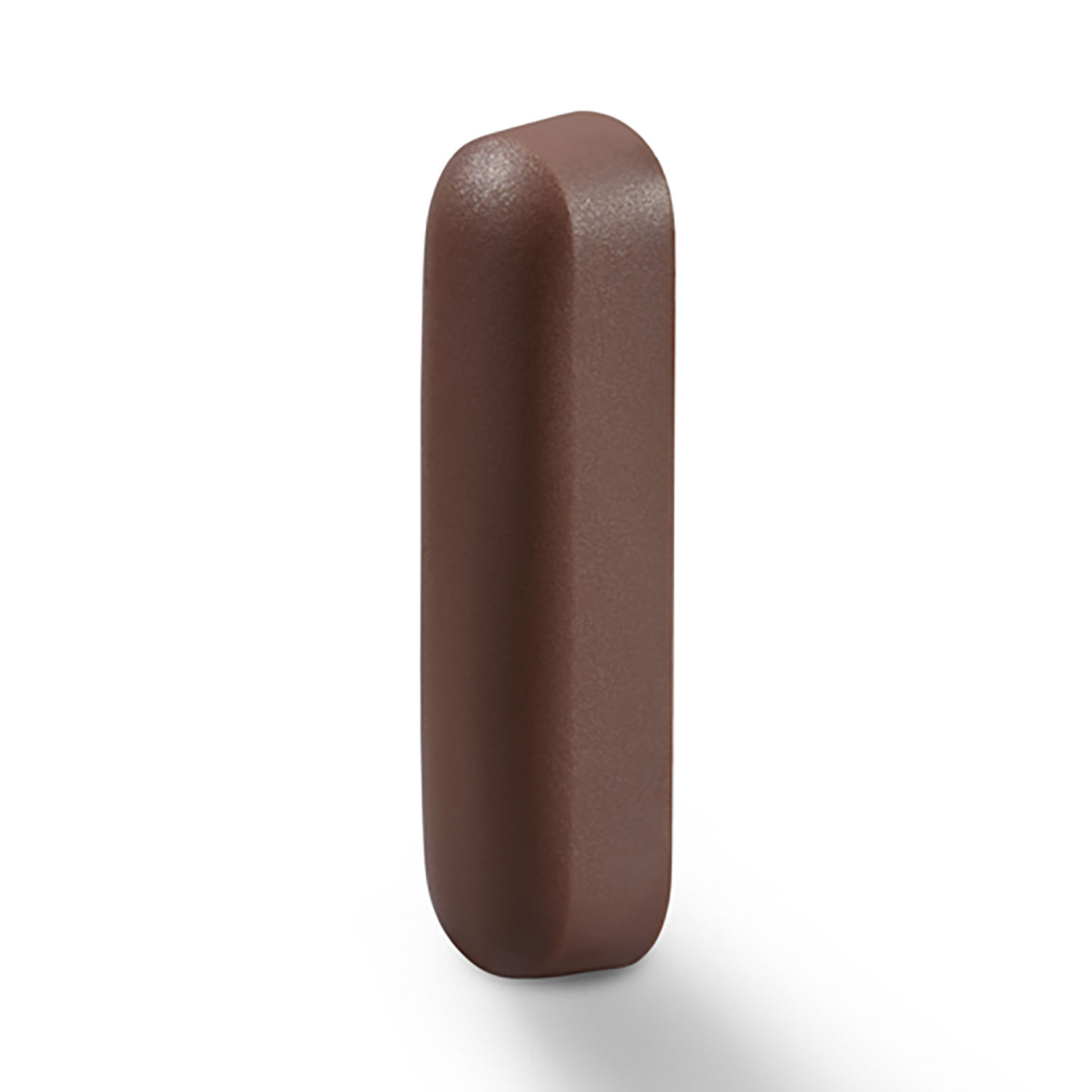 Brązowy, prostokątny obiekt z zaokrąglonymi rogami stoi pionowo. Rzuca cień na białym tle.