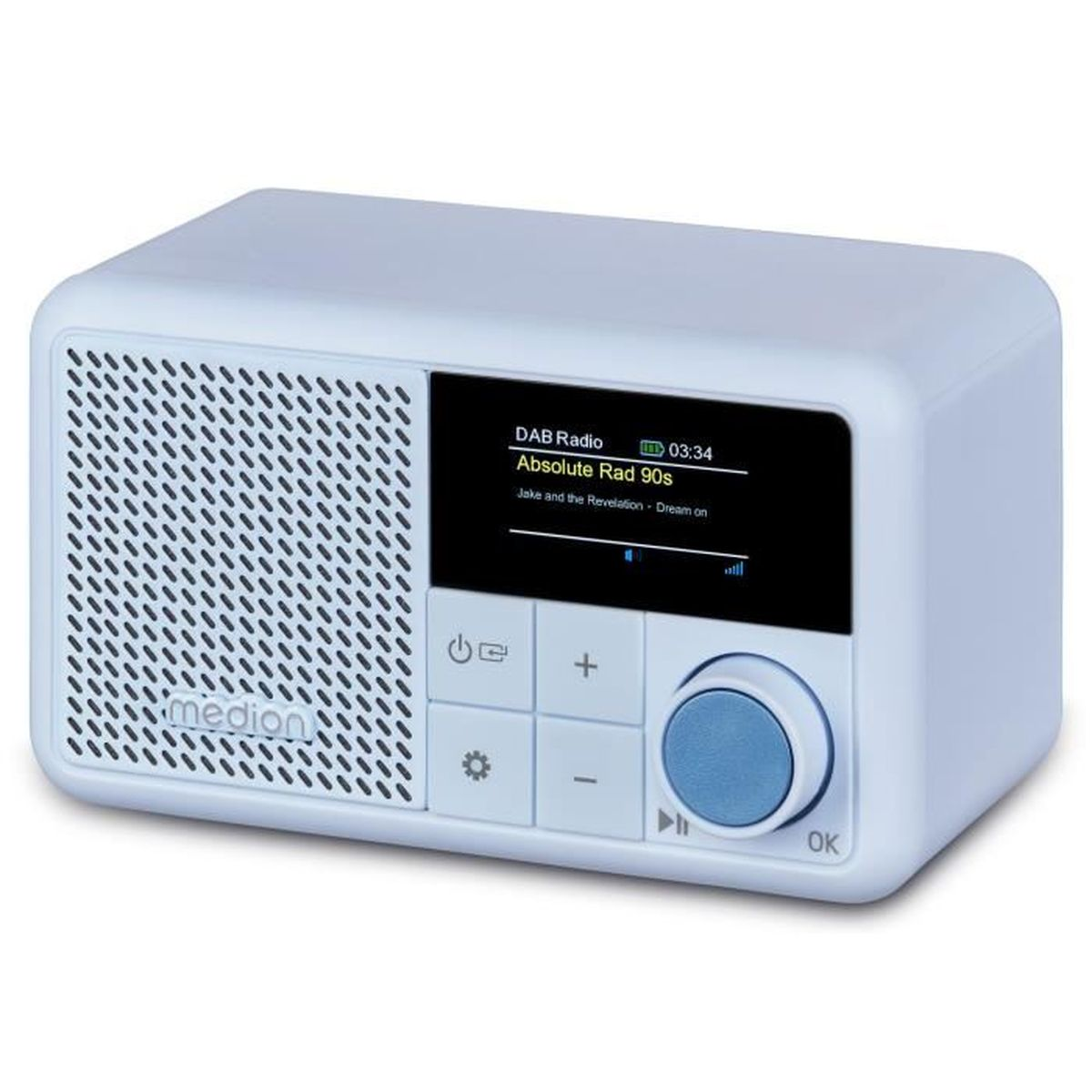 A white DAB radio displays a song title on its screen. It has buttons for volume, power, and preset selection. The radio is in focus.