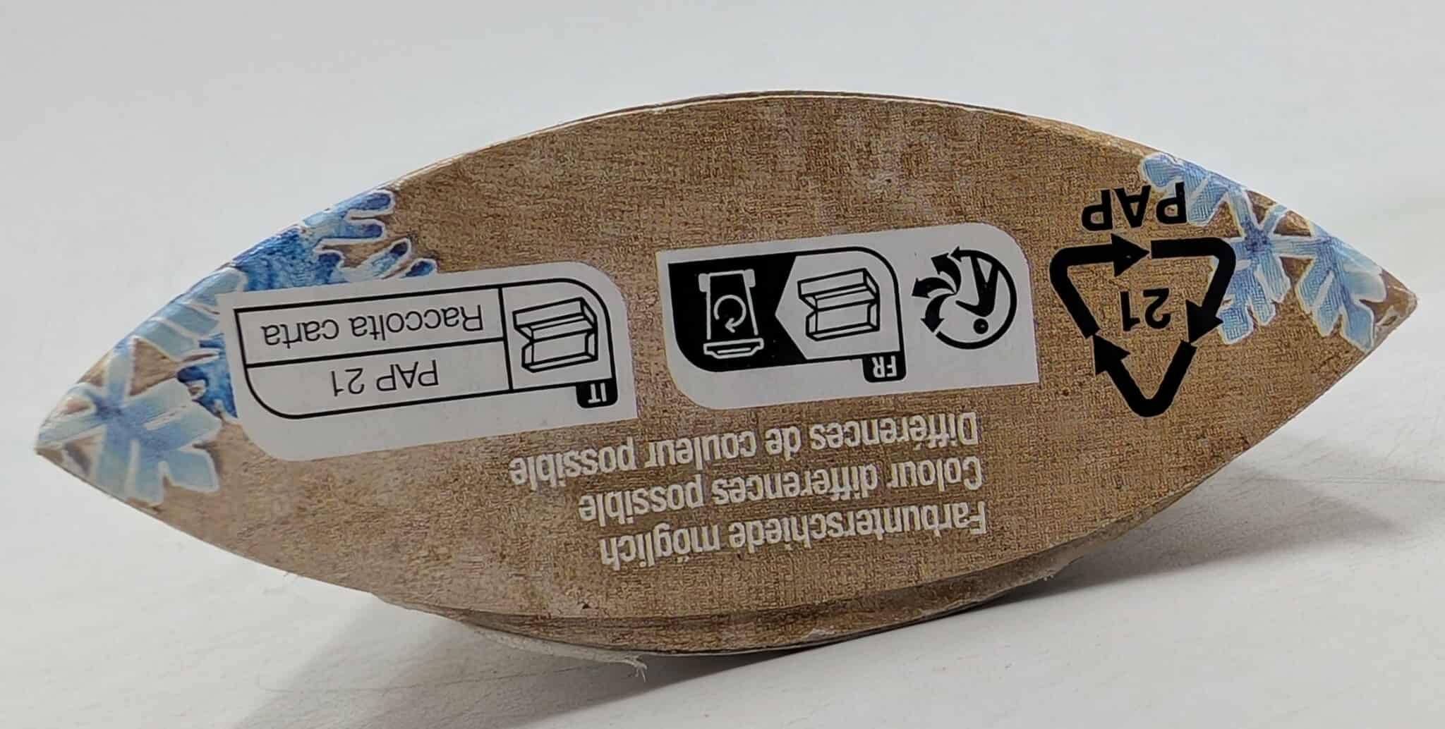Cardboard packaging with recycling symbols, text in Italian, French, and German. Blue snowflake design on the edge.