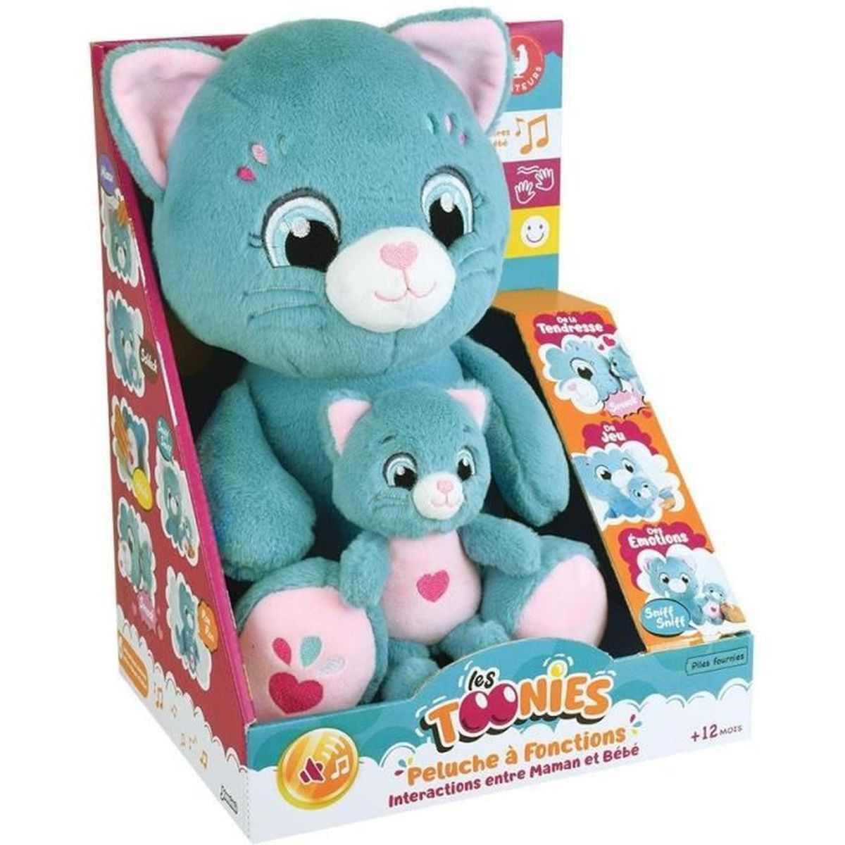 Ein blaues Katzenplüschtier mit einem kleineren in einer Schachtel. Die Schachtel hat Illustrationen und Text auf Französisch. Die Spielzeuge haben rosa Akzente.