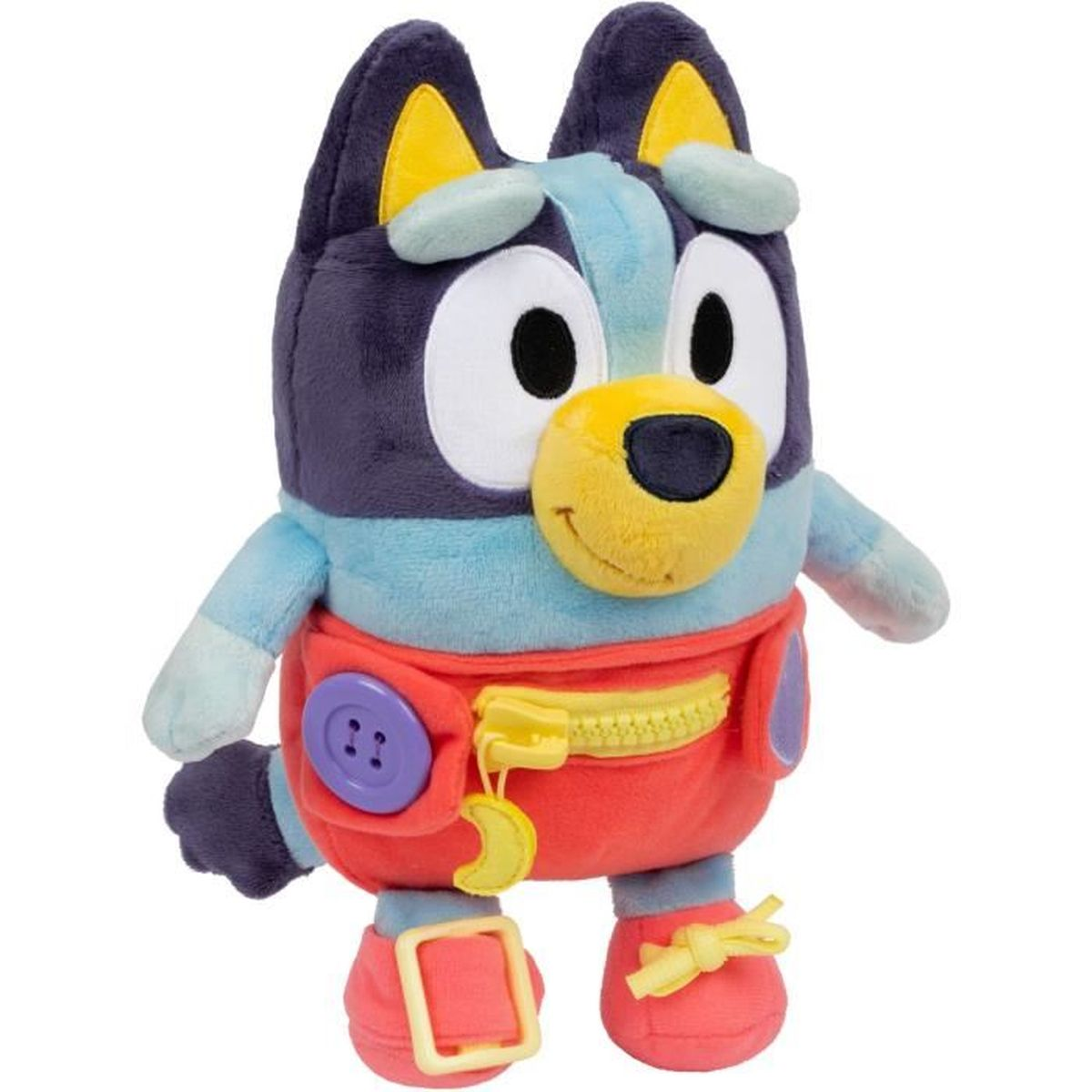 Une peluche d'un chien de dessin animé. Il a un corps bleu et violet, des oreilles jaunes et un short rouge avec une fermeture éclair et un bouton.