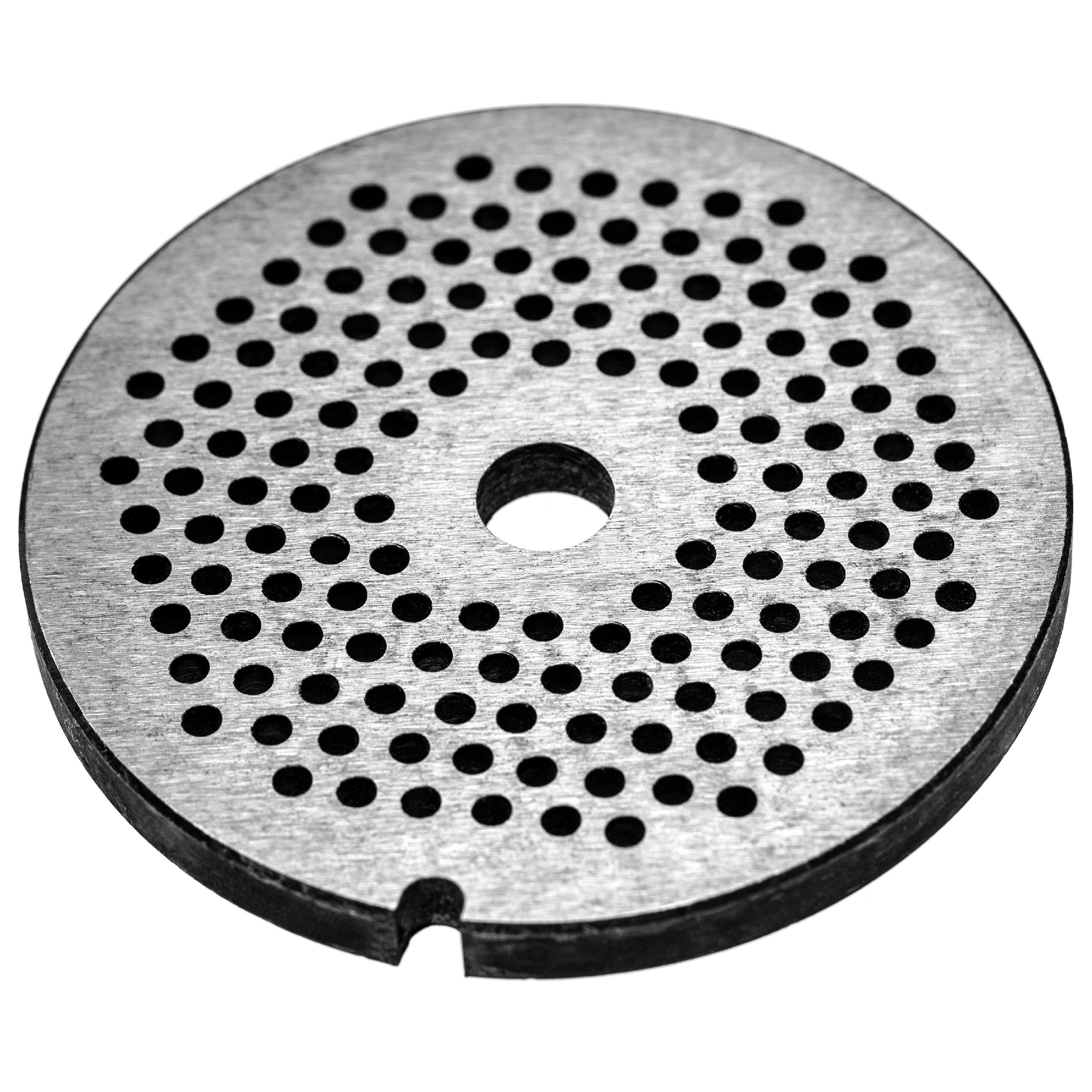 Eine Metallplatte mit vielen kleinen Löchern und einem großen Mittelloch. Sie ist rund und hat einen dunklen Rand.