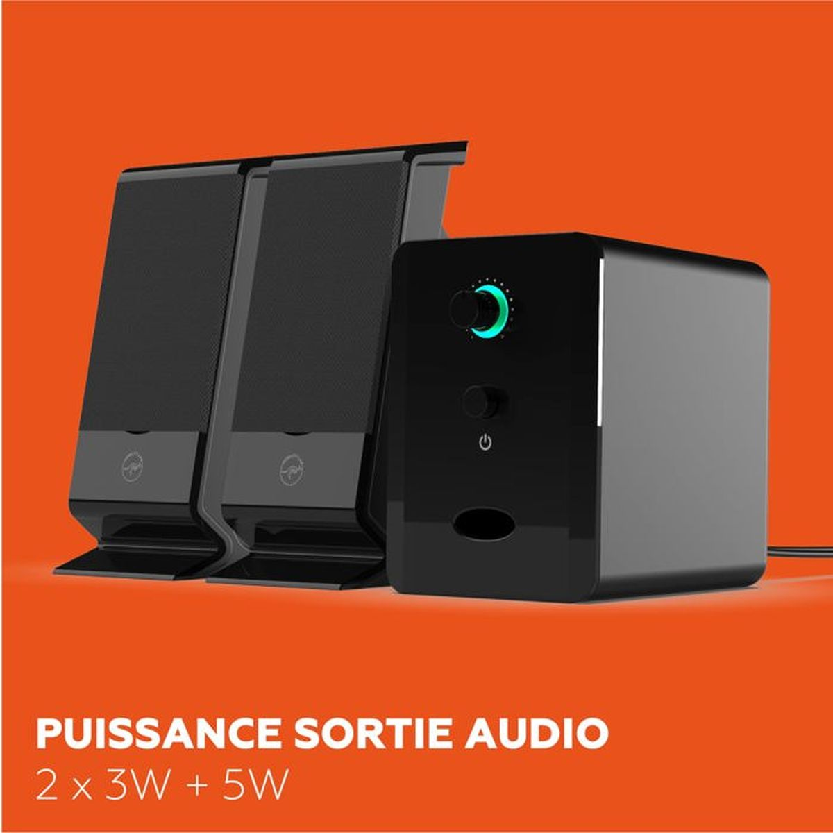 Altoparlanti neri con pannello di controllo e pulsante di accensione. Sfondo arancione. Testo: PUISSANCE SORTIE AUDIO 2 x 3W + 5W.