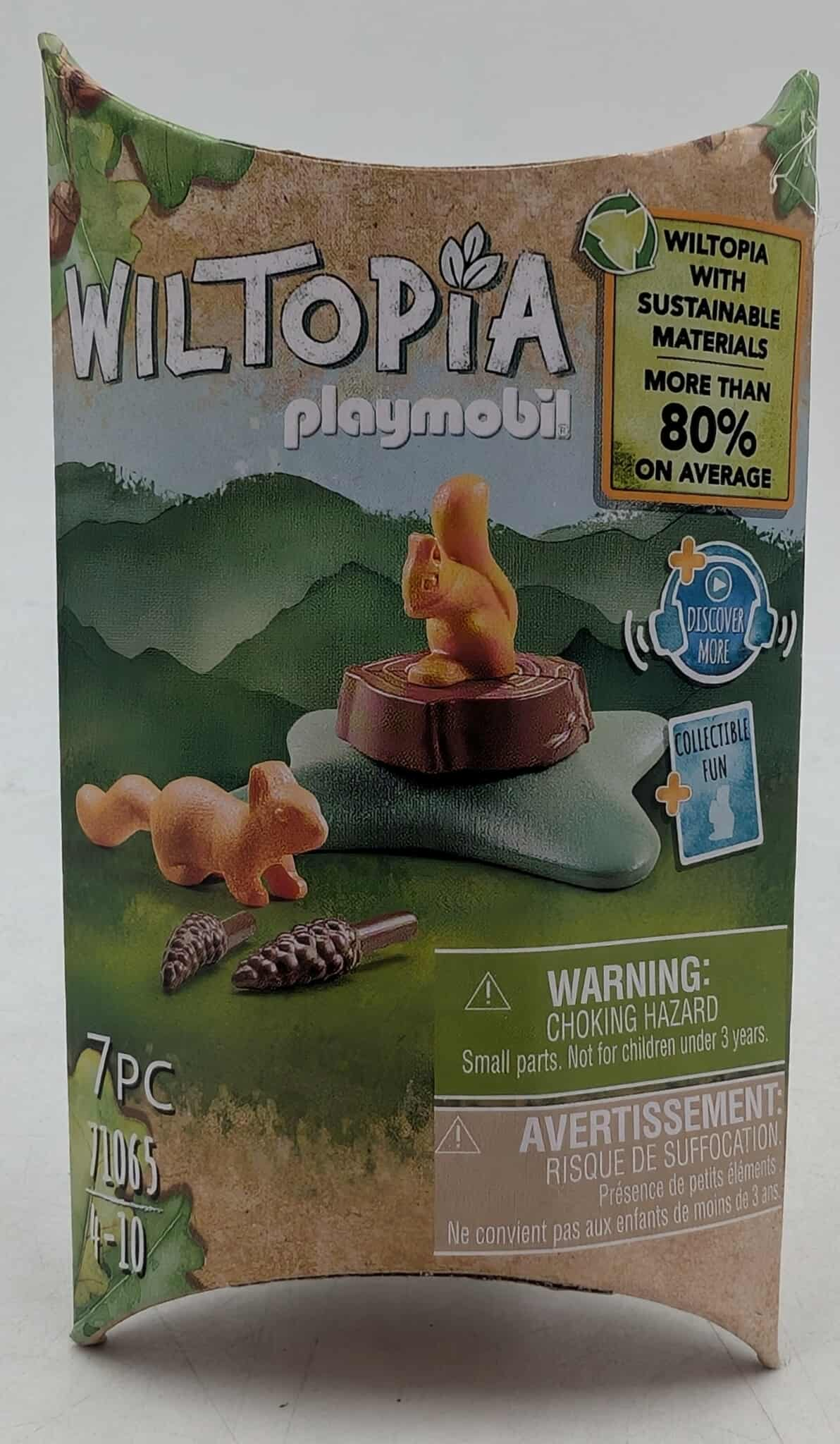 Box with Playmobil Wiltopia set. Includes squirrel figures, tree stumps, and pinecones. The box is green and brown.