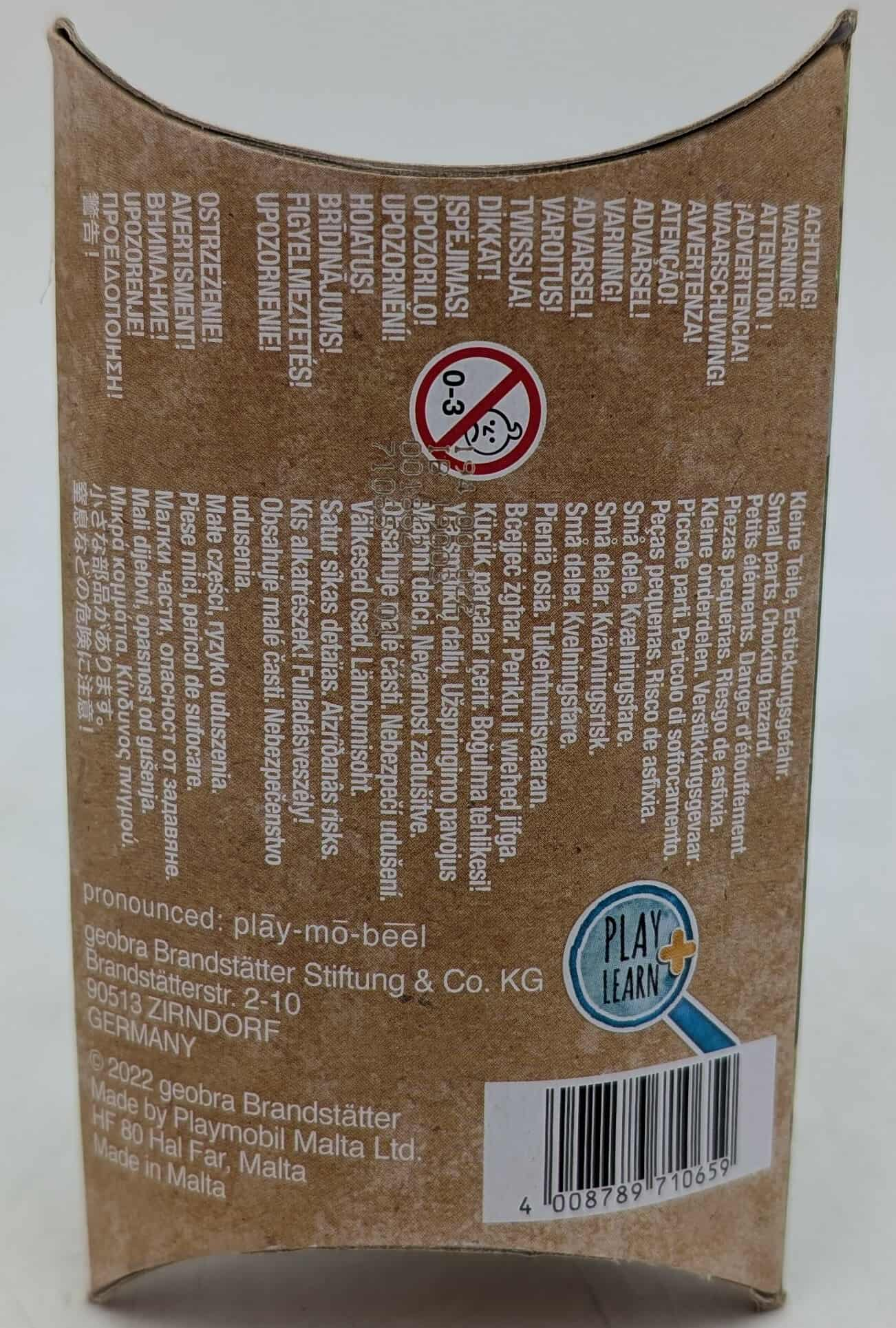 A product box with warnings in multiple languages. A 'Play & Learn' logo and barcode are visible.