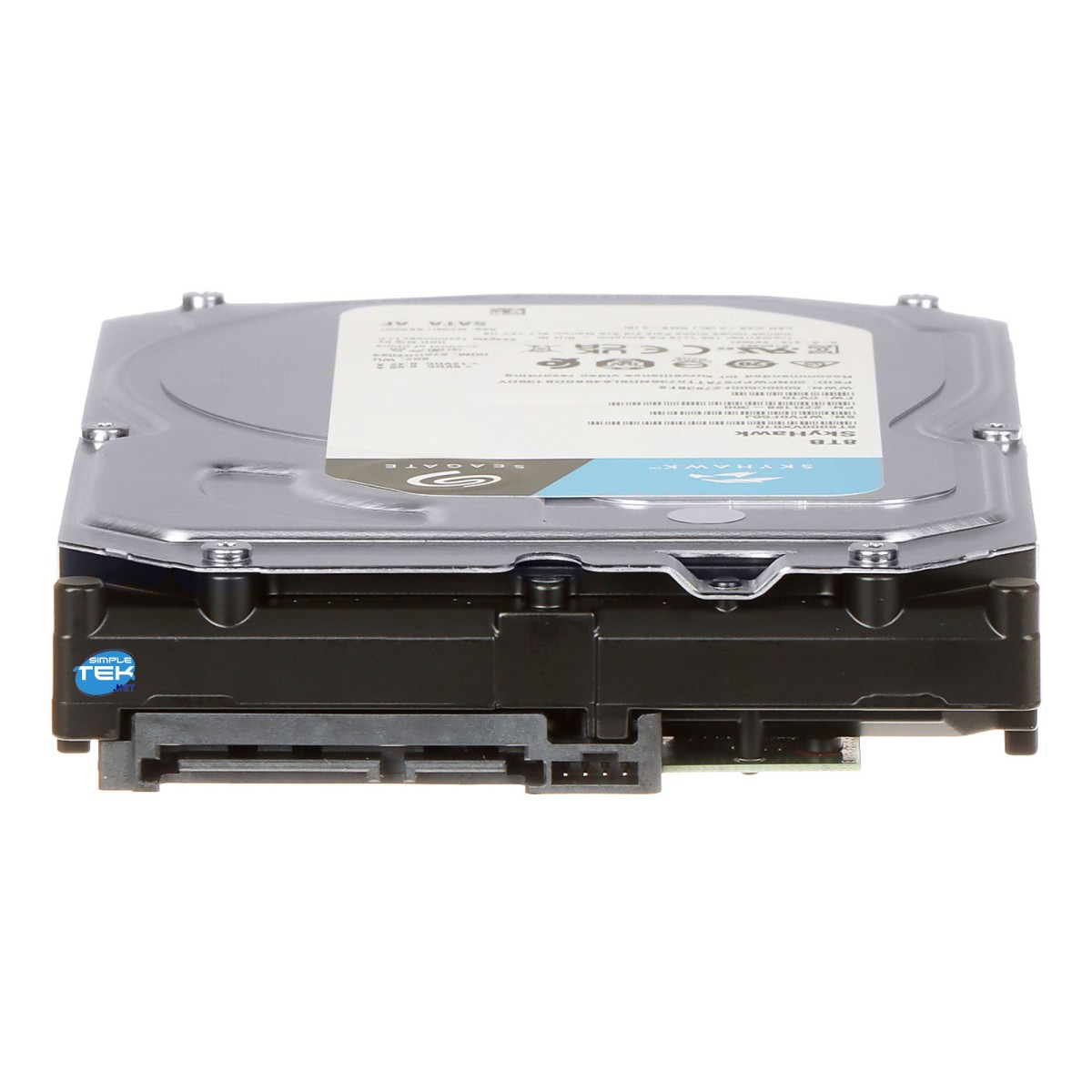 Dysk twardy, srebrna góra z czarną podstawą. Etykieta mówi Seagate. Tło jest białe.