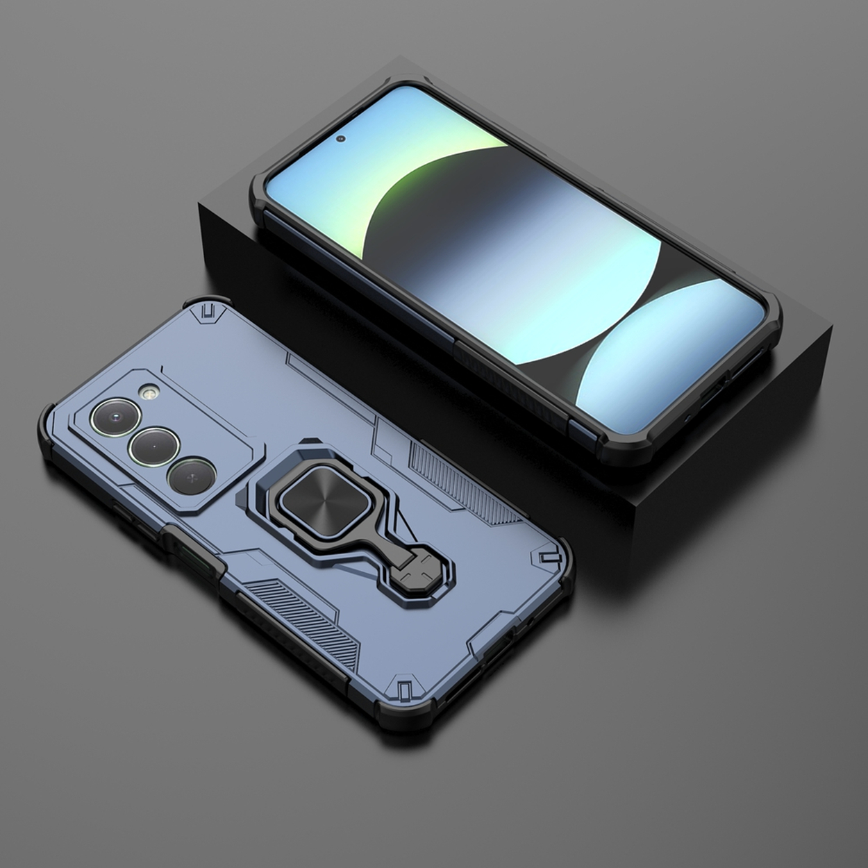 Deux smartphones avec étuis. L'un est sur un support noir. L'autre, un étui bleu avec un support annulaire, est en dessous. Le fond est sombre.