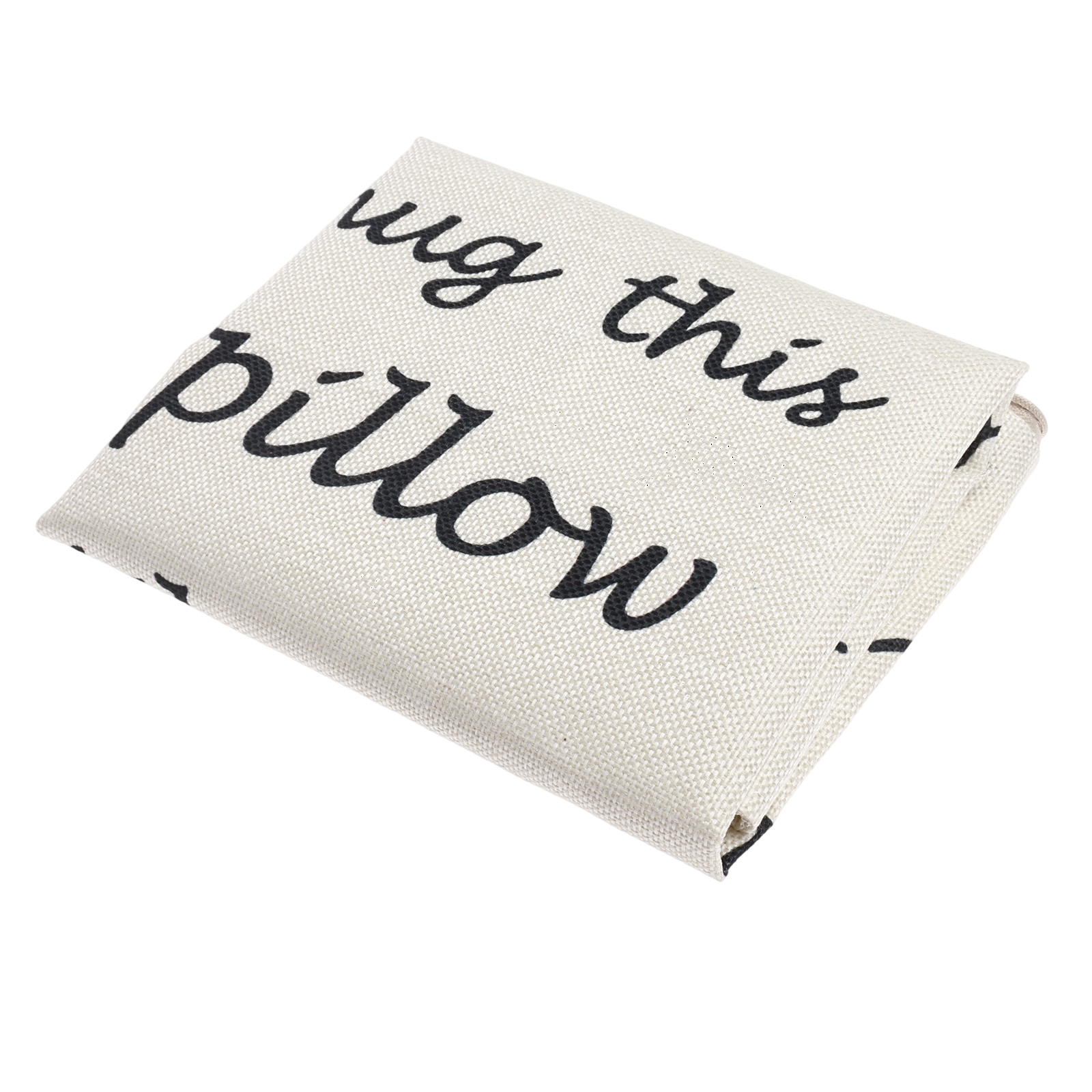 Ein gefaltetes cremefarbenes Kissen mit den Worten 'hug this pillow' in schwarzer Schrift.