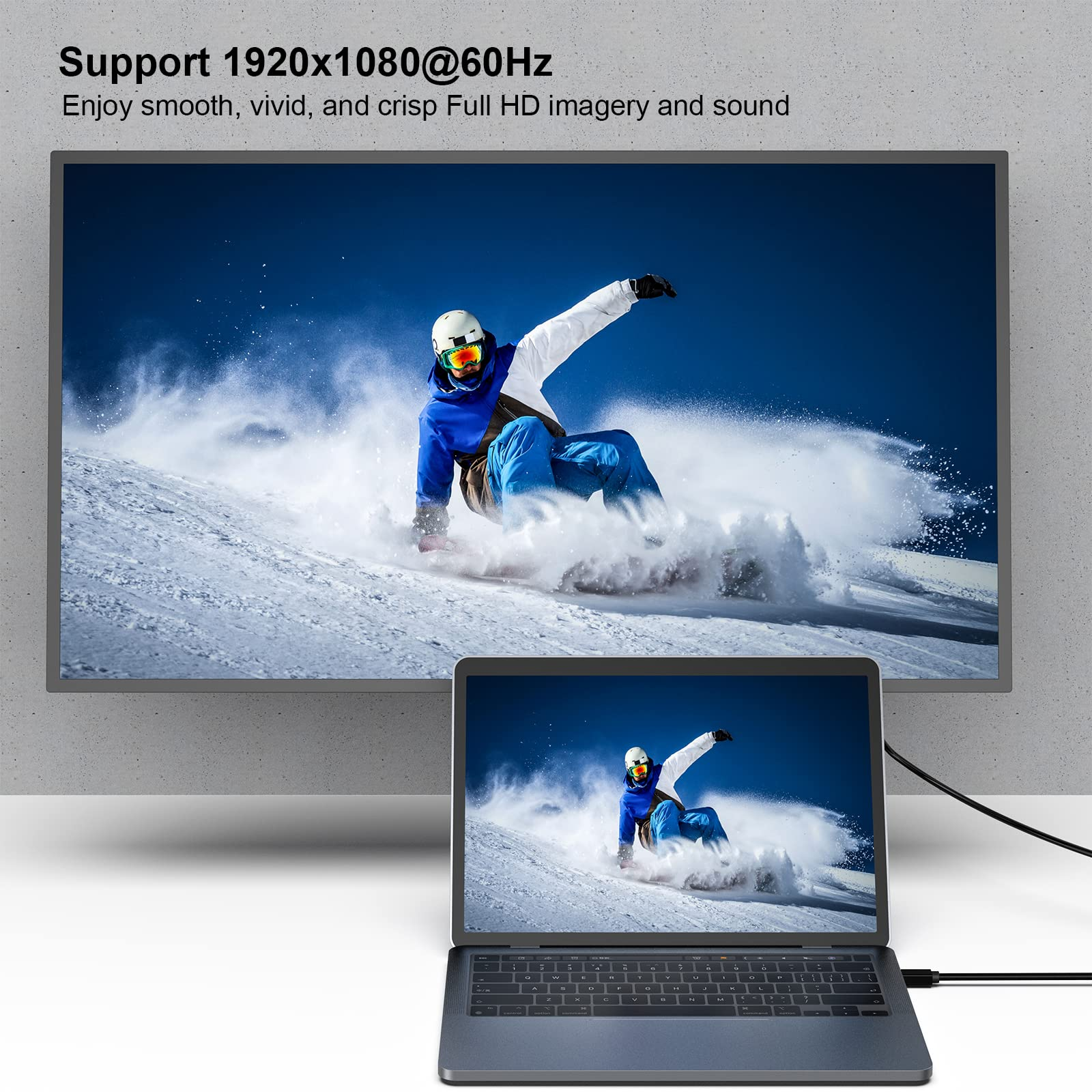 Ein Snowboarder in Aktion auf einem Bildschirm und einem Laptop, beide zeigen das gleiche Bild. Ein weißer Hintergrund.