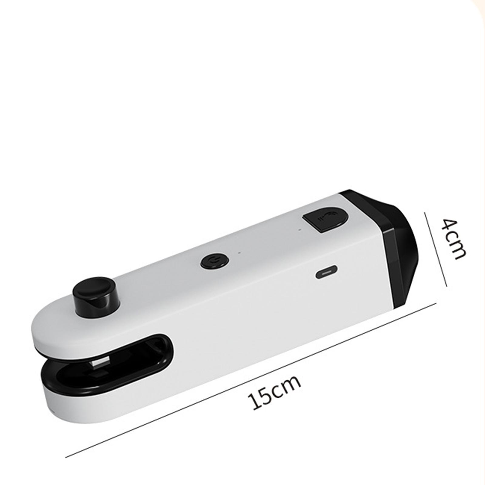 Ein weißes und schwarzes Gerät mit beschrifteten Abmessungen. Es hat Knöpfe und ein schwarzes Ende. Das Gerät ist 15 cm lang und 4 cm breit.