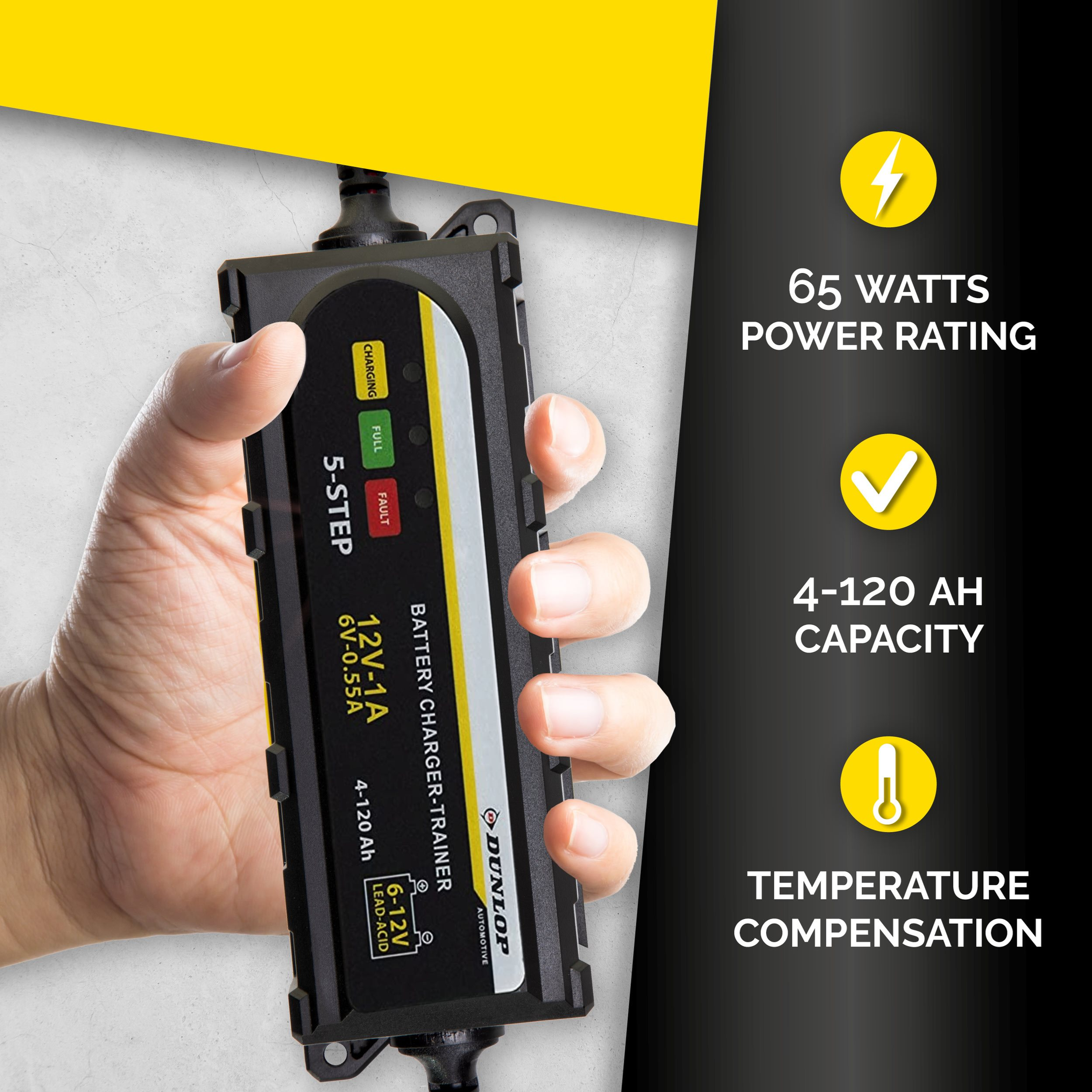 A hand holding a black battery charger. Features include charging status lights, power rating, and capacity details.