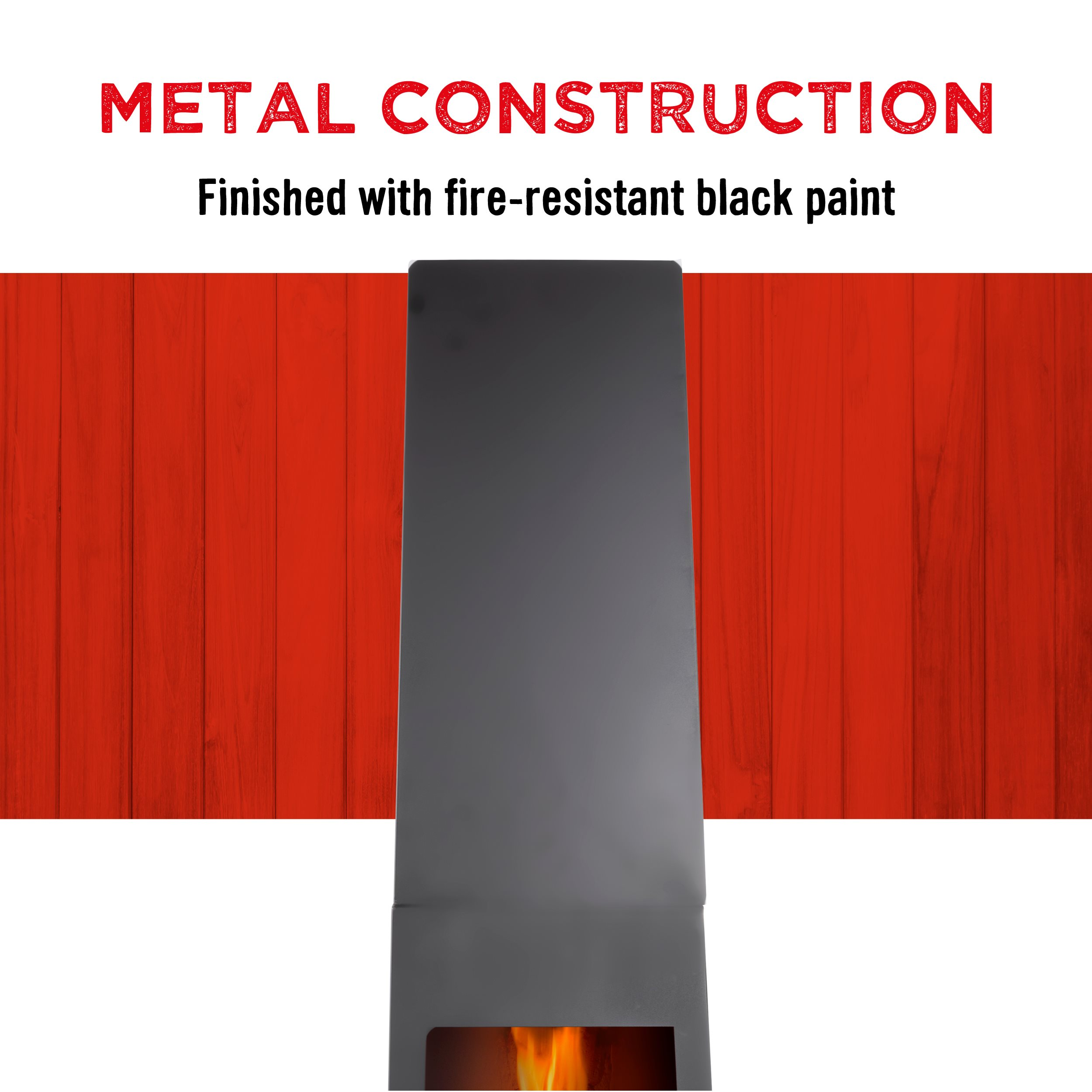 Een zwarte metalen constructie. Het heeft een rode houten achtergrond. De constructie heeft vuur aan de onderkant.