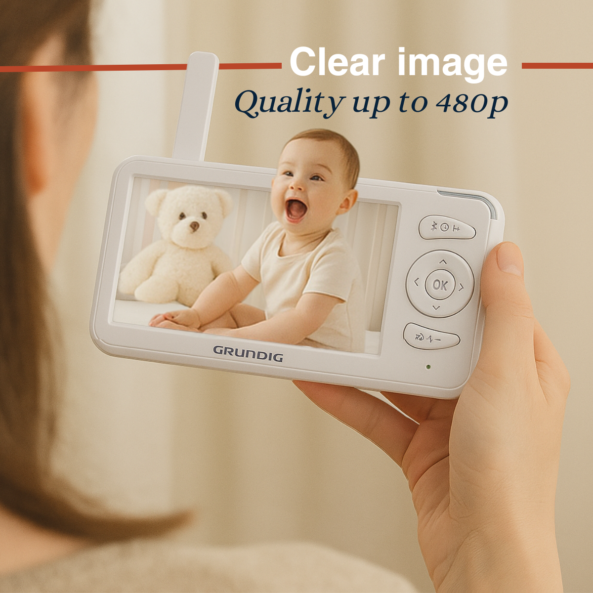A baby monitor displays a laughing baby and a teddy bear. A hand holds the monitor. Text says 'Clear image, Quality up to 480p'.