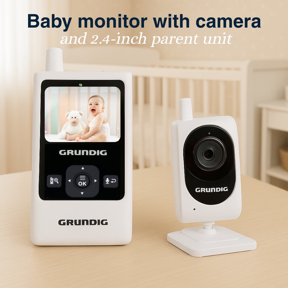 A baby monitor set with a screen showing a baby and a teddy bear. The camera is on the right.