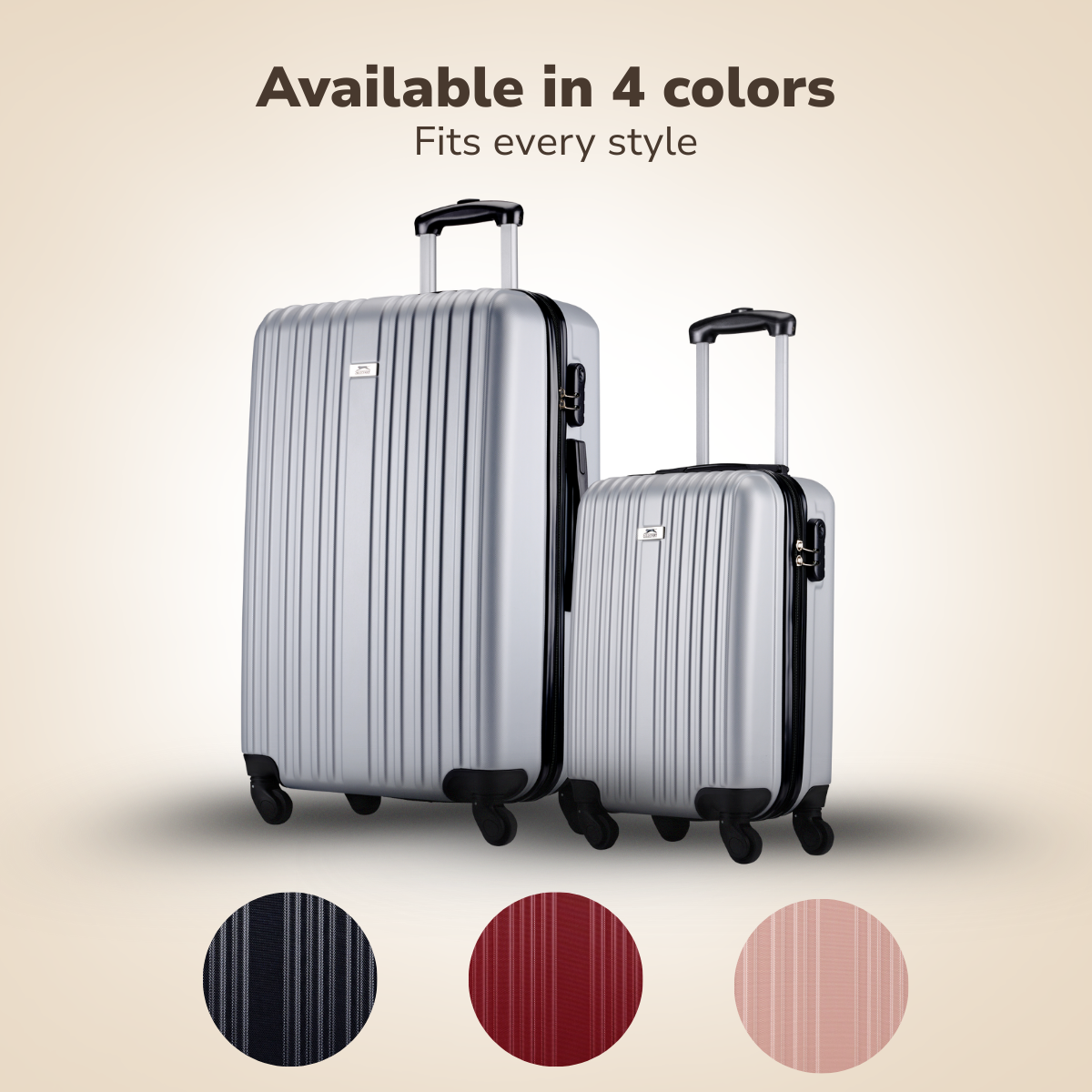 Two silver suitcases with handles, in front of a light background. Below are fabric samples in navy, red, and pink.
