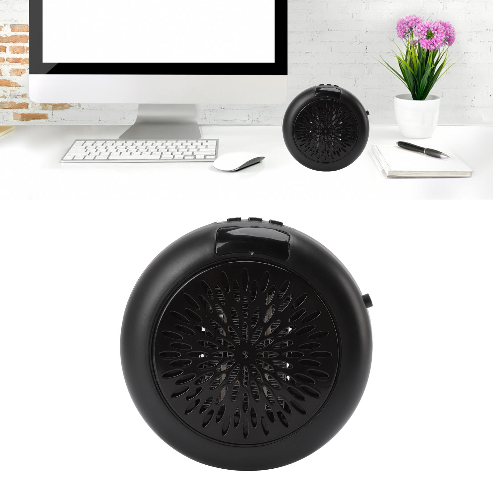 Ein schwarzer, runder Heizlüfter steht auf einem weißen Schreibtisch. Ein Computer, eine Tastatur, eine Maus und Blumen sind ebenfalls vorhanden.