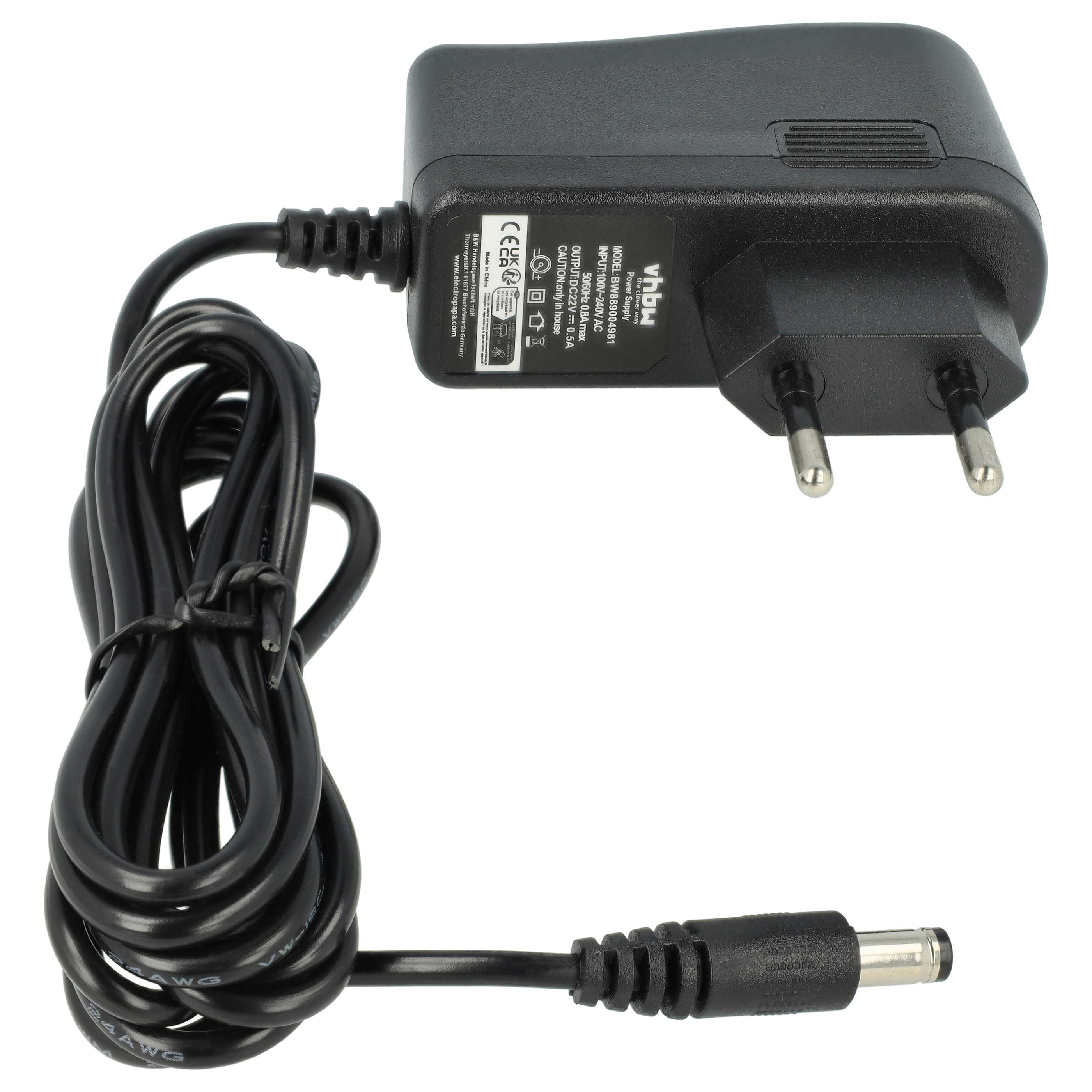 Ein schwarzes Netzteil mit schwarzem Kabel und DC-Anschluss. Der Adapter hat einen zweipoligen Stecker.