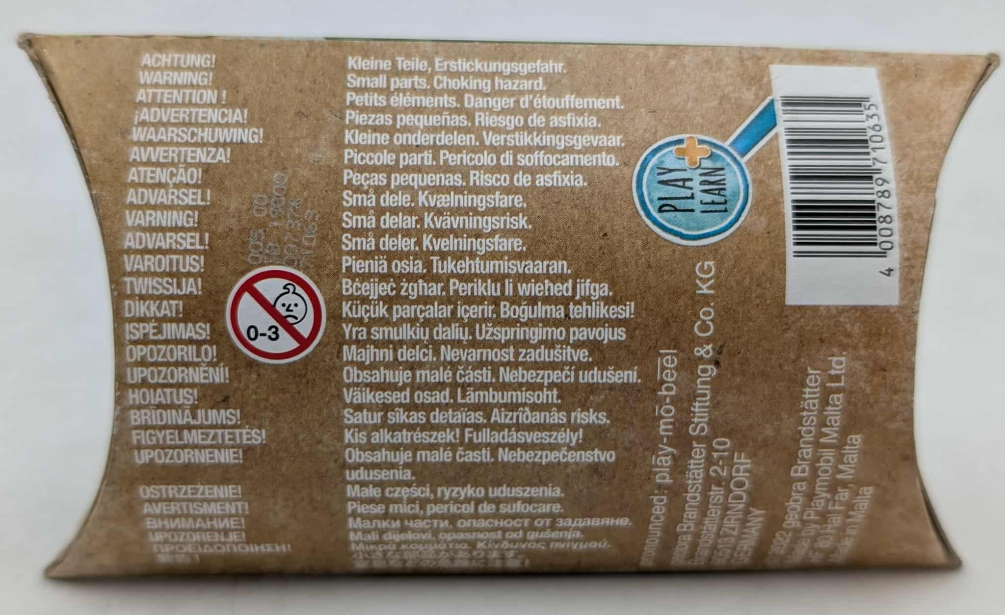 Box with warnings in multiple languages, includes a choking hazard symbol and a barcode.