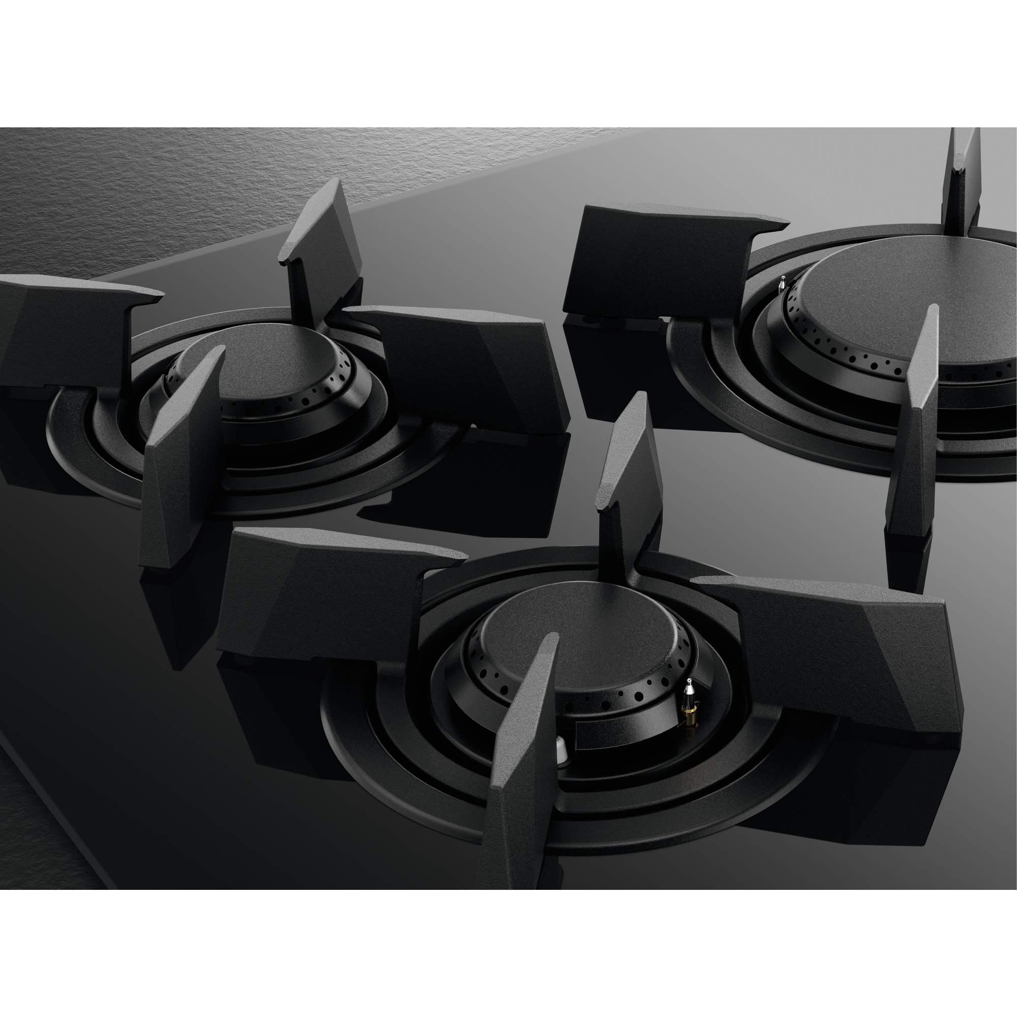 Primo piano di un piano cottura nero con quattro fuochi. Ogni fuoco ha un design circolare con supporti angolati.