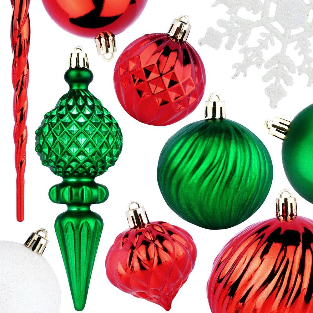 Adornos navideños en rojo, verde y blanco. Hay varias formas y texturas presentes, incluyendo bolas, lágrimas y un copo de nieve.