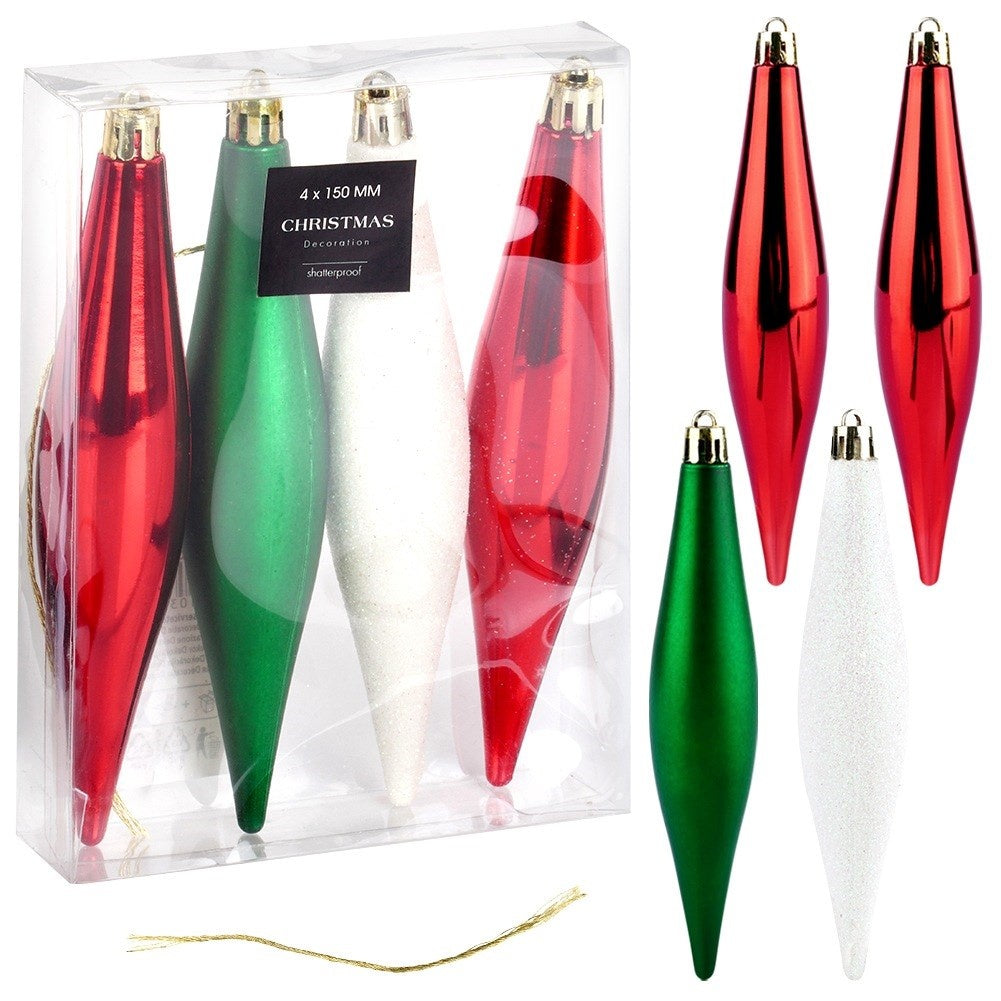 Un juego de adornos navideños. Cuatro en una caja: rojo, verde, blanco. Cuatro sueltos: dos rojos, uno verde y uno blanco. Brillantes y escarchados.