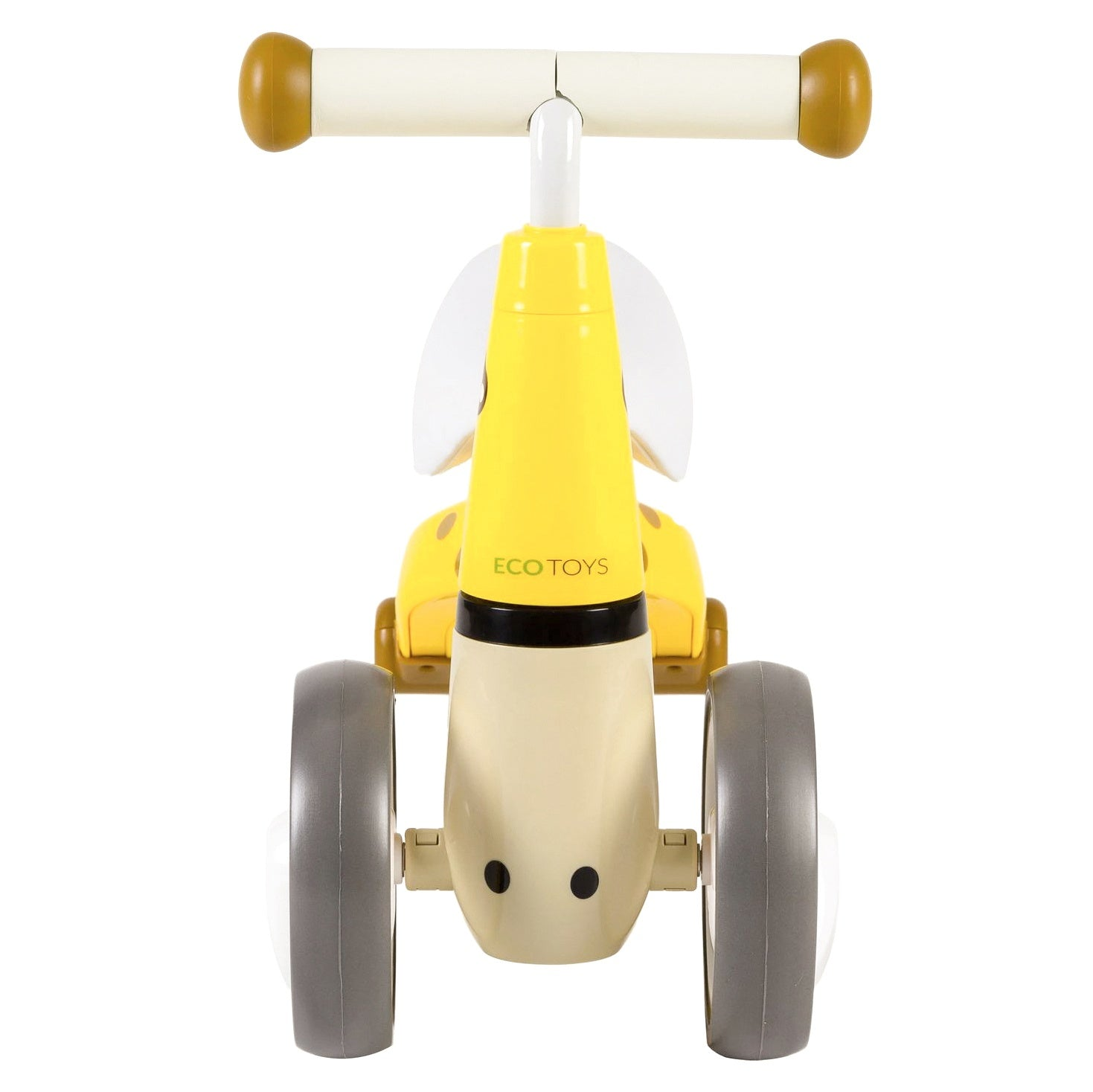 Una bicicleta de equilibrio para bebés amarilla y crema. Tiene ruedas grises, un manillar blanco y un asiento amarillo. La bicicleta está sobre un fondo blanco.