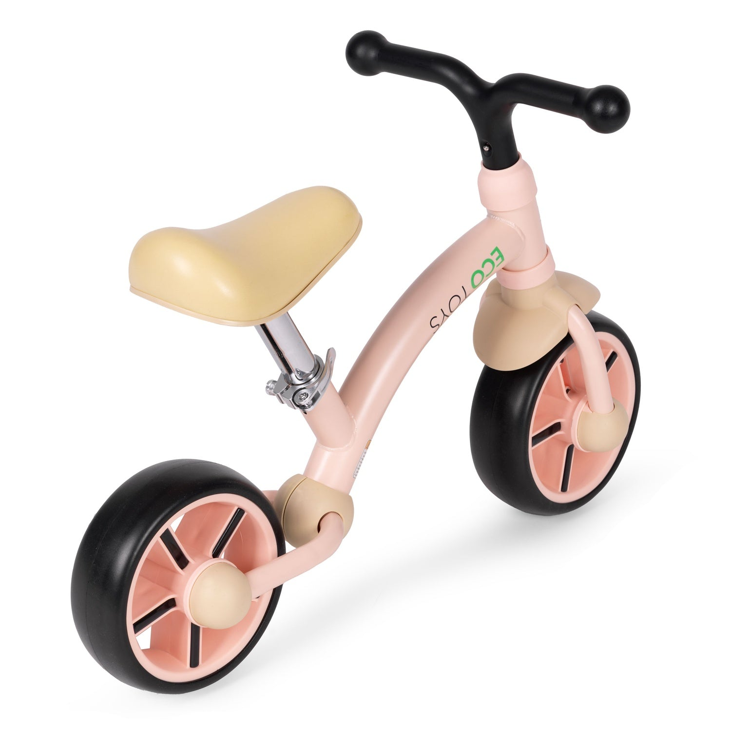 Una bicicleta de equilibrio rosa para niños. Tiene un asiento y detalles color beige, neumáticos y manillar negros. La marca ECO TOYS es visible.