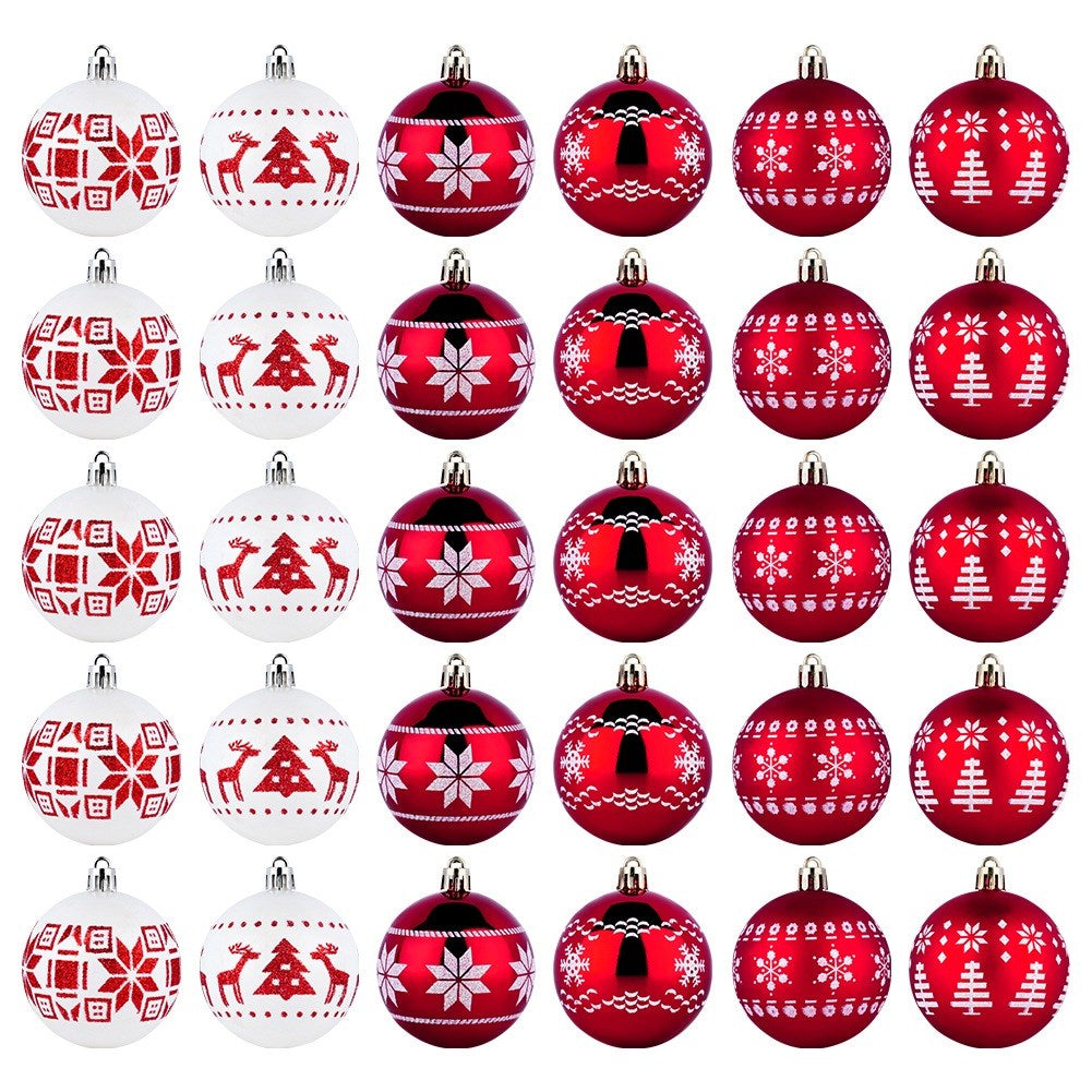 Conjunto de adornos navideños. Algunos son blancos con patrones rojos, otros rojos con patrones blancos. Varios diseños.