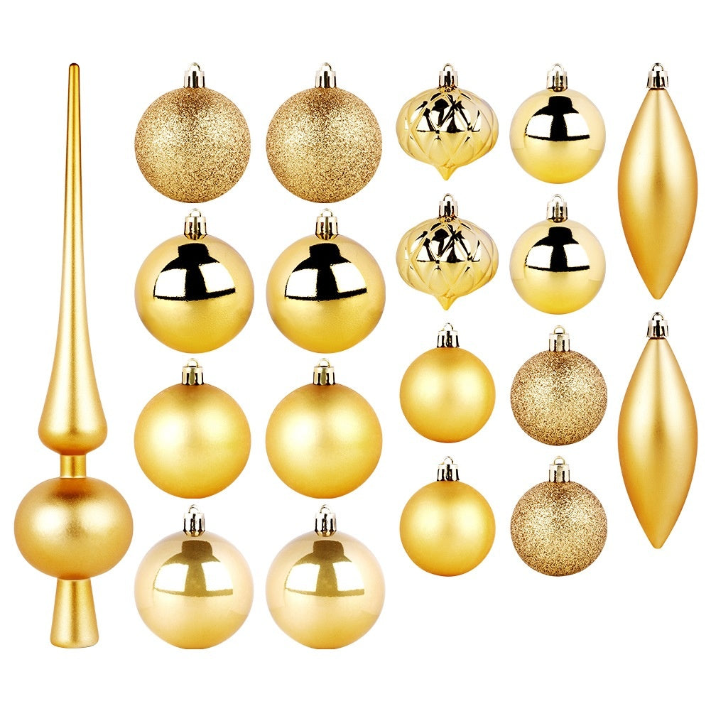 Adornos navideños dorados: bolas, lágrimas y un adorno para el árbol. Texturas variadas, desde brillo hasta liso, todo dorado sobre un fondo blanco.