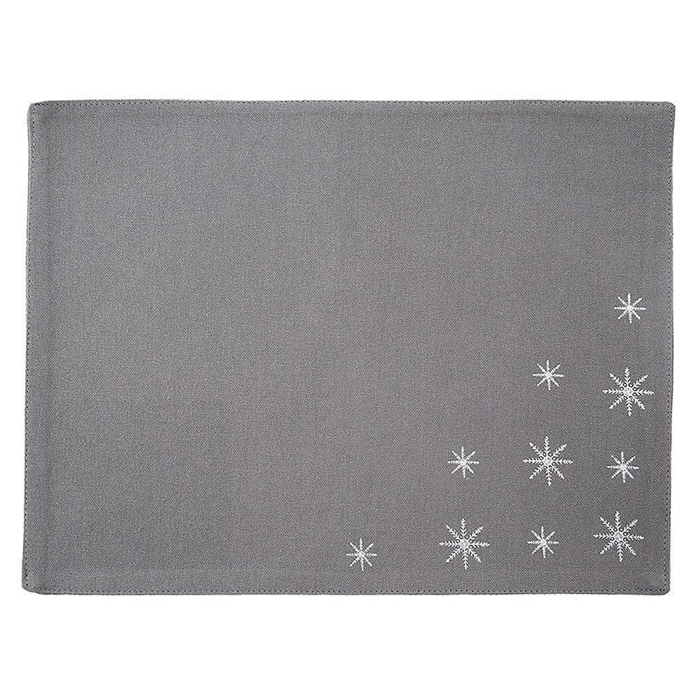 Mantel individual rectangular gris con diseño de copos de nieve blancos en la esquina.