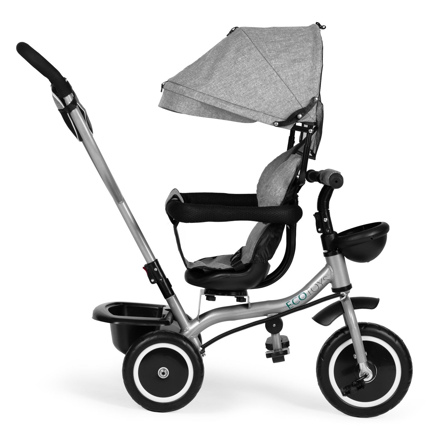 Un triciclo gris con capota. Tiene un asa para padres, un asiento con cinturón de seguridad y el logotipo de ECO TOYS.