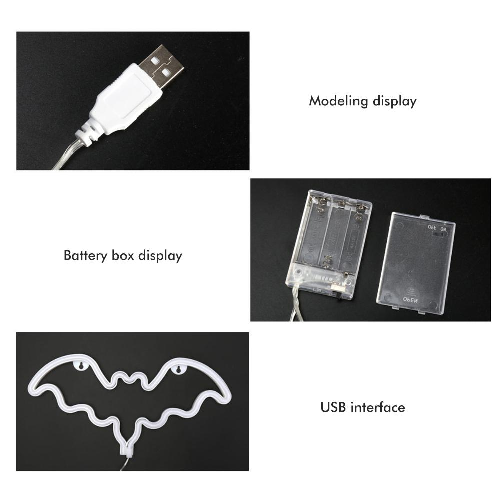 Das Bild zeigt Komponenten: USB-Anschluss, Batteriekasten und eine fledermausförmige LED-Leuchte. Textbezeichnungen beschreiben die Teile.
