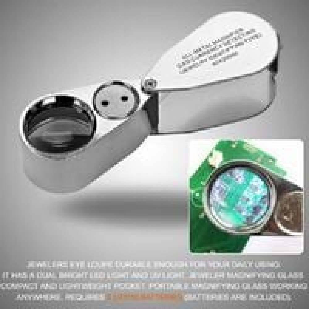 Eine silberne Juwelierlupe mit Lupe und LED-Licht, gezeigt mit einer Nahaufnahme einer vergrößerten Platine.
