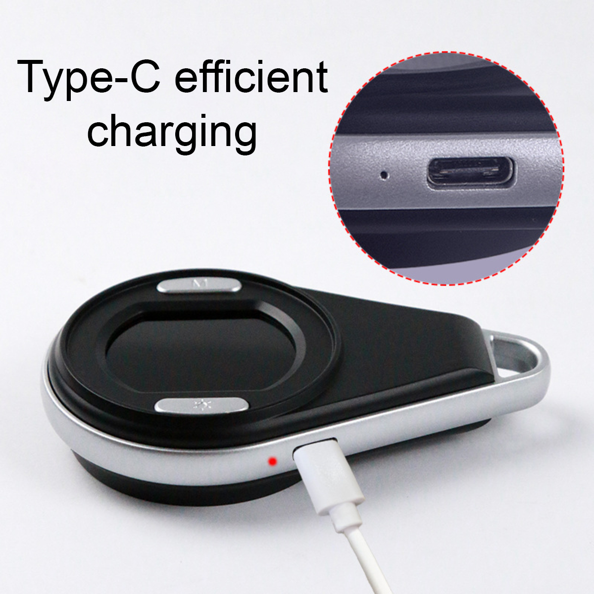 Schwarzes und silbernes Ladegerät mit weißem Kabel. Ein kleinerer Einsatz zeigt einen USB-C-Anschluss.