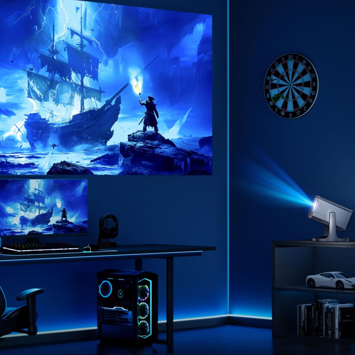Un projecteur affiche une scène de navire pirate avec des éclairs. Une cible de fléchettes est accrochée au mur. Une configuration informatique est sur un bureau.