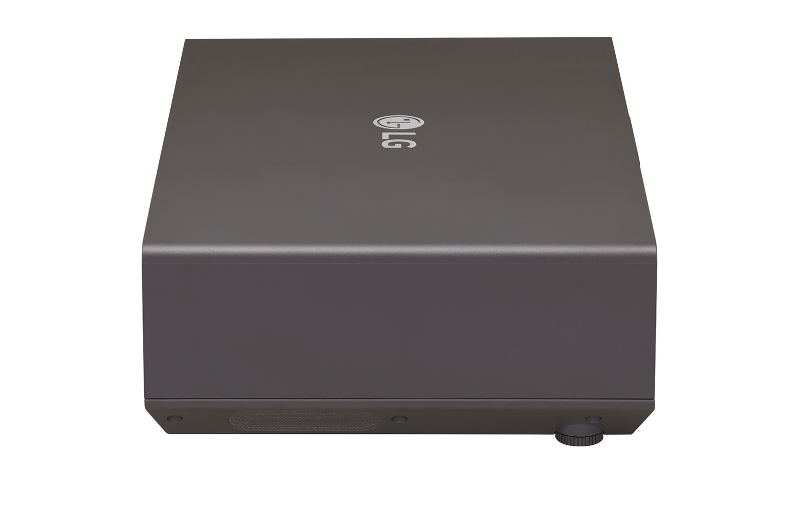 Ciemnoszary projektor LG na białym tle. Logo LG jest widoczne na górze. Pokrętło znajduje się po prawej stronie.