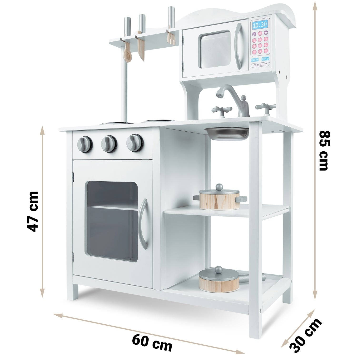 Una cocina de juguete de madera blanca con horno, microondas, fregadero y utensilios de cocina. Las dimensiones están etiquetadas en cm.