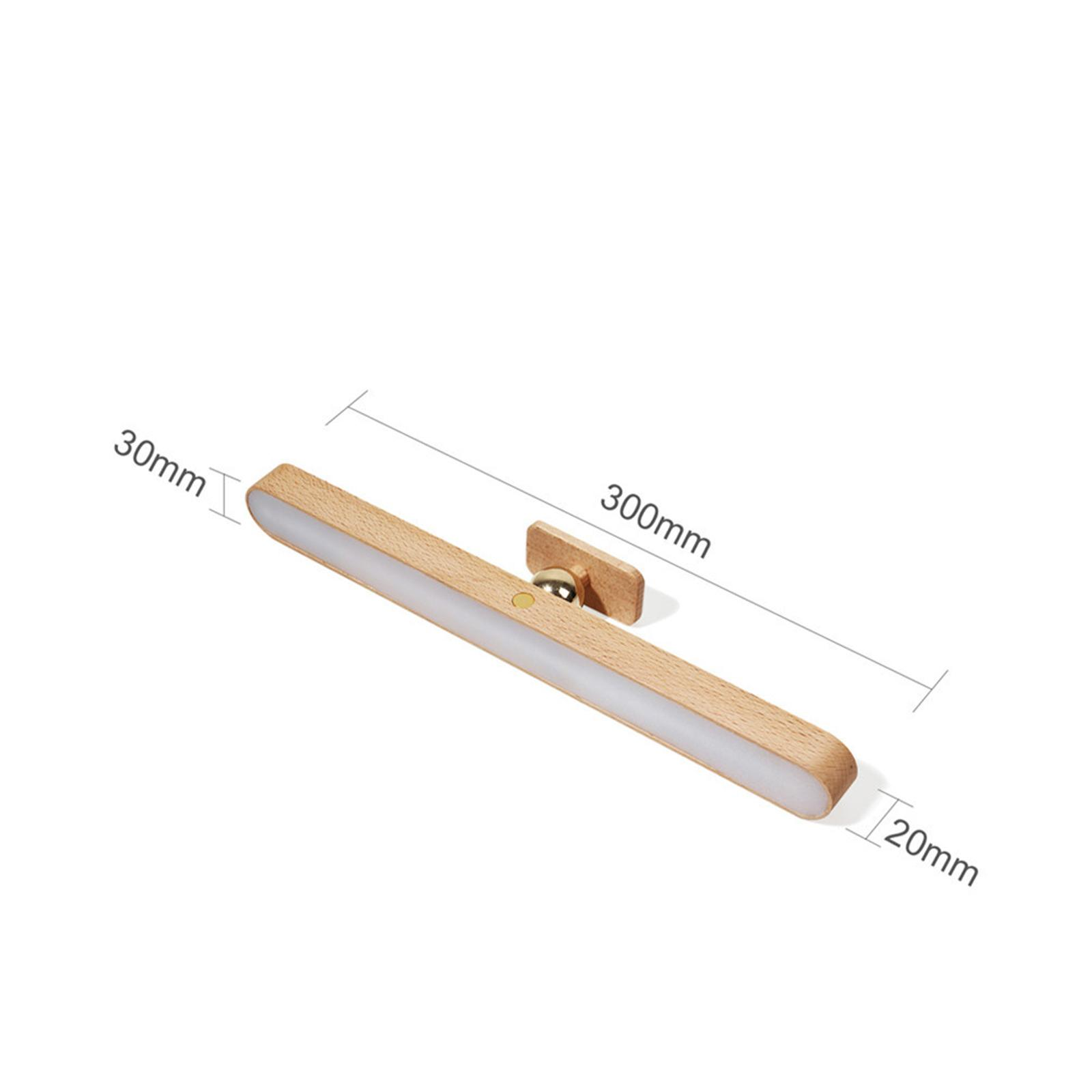 Ein hölzernes LED-Licht mit rechteckiger Form, Abmessungen sind 300x30x20mm, und eine kleine Halterung. Das Licht ist auf weißem Hintergrund.