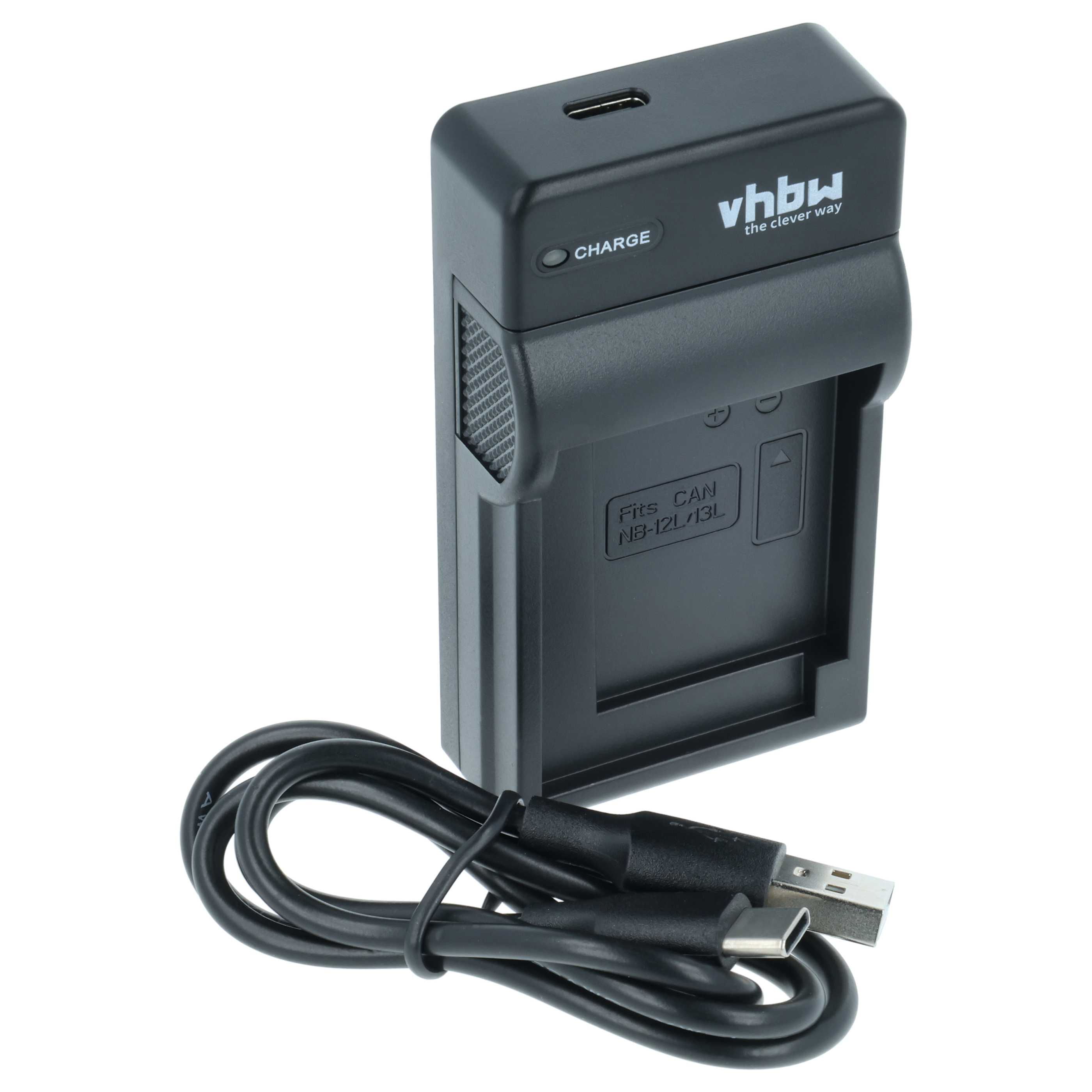 Ein schwarzes Kamera-Batterieladegerät mit USB-Kabel. Das Ladegerät trägt den Markennamen "vhbw" und die Aufschrift "CHARGE".